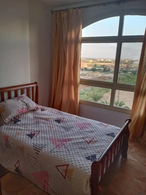 Bed in Flat in Royal Plaza Alexandria in front of El Montazah garden