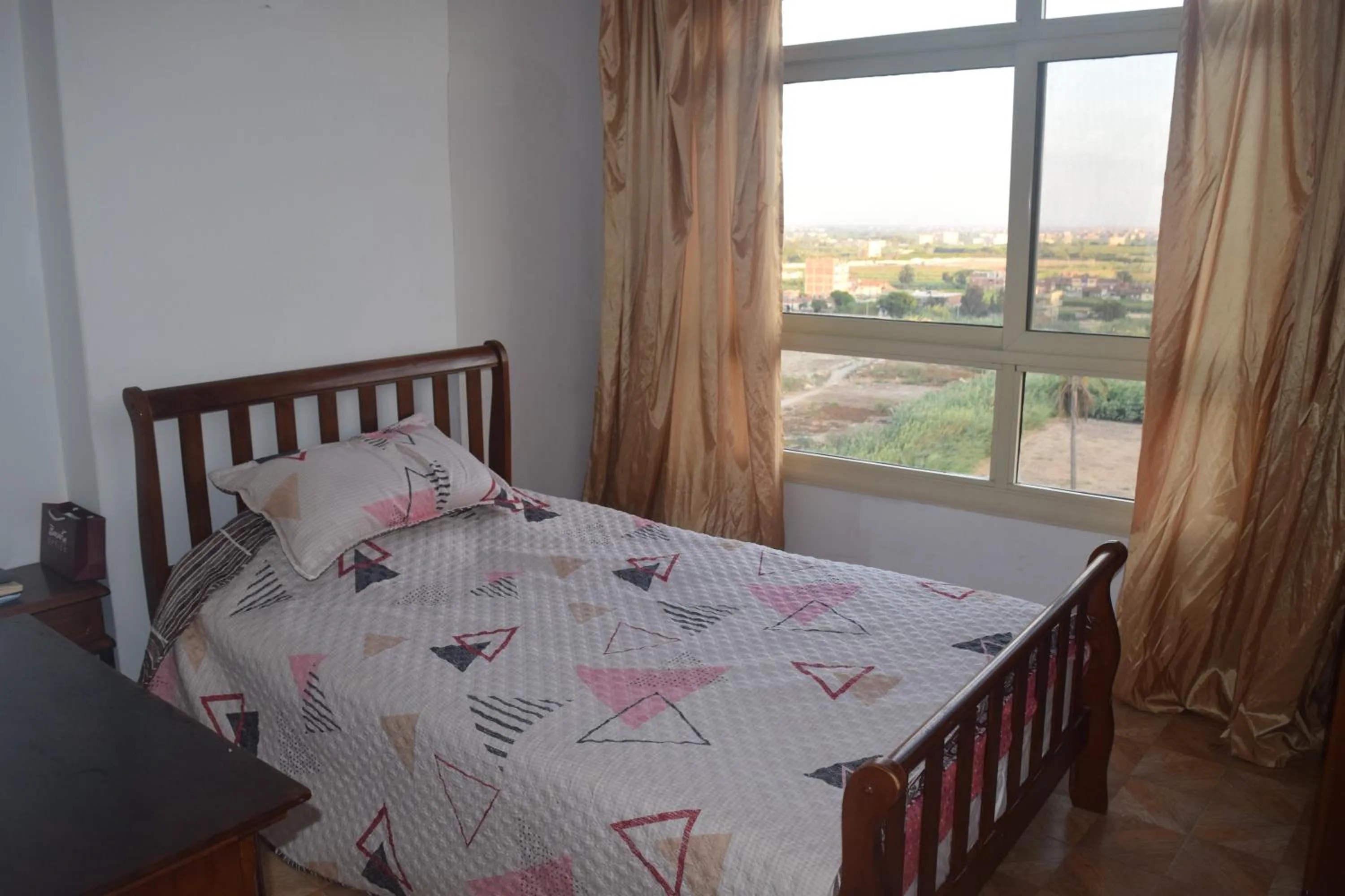 Bed in Flat in Royal Plaza Alexandria in front of El Montazah garden