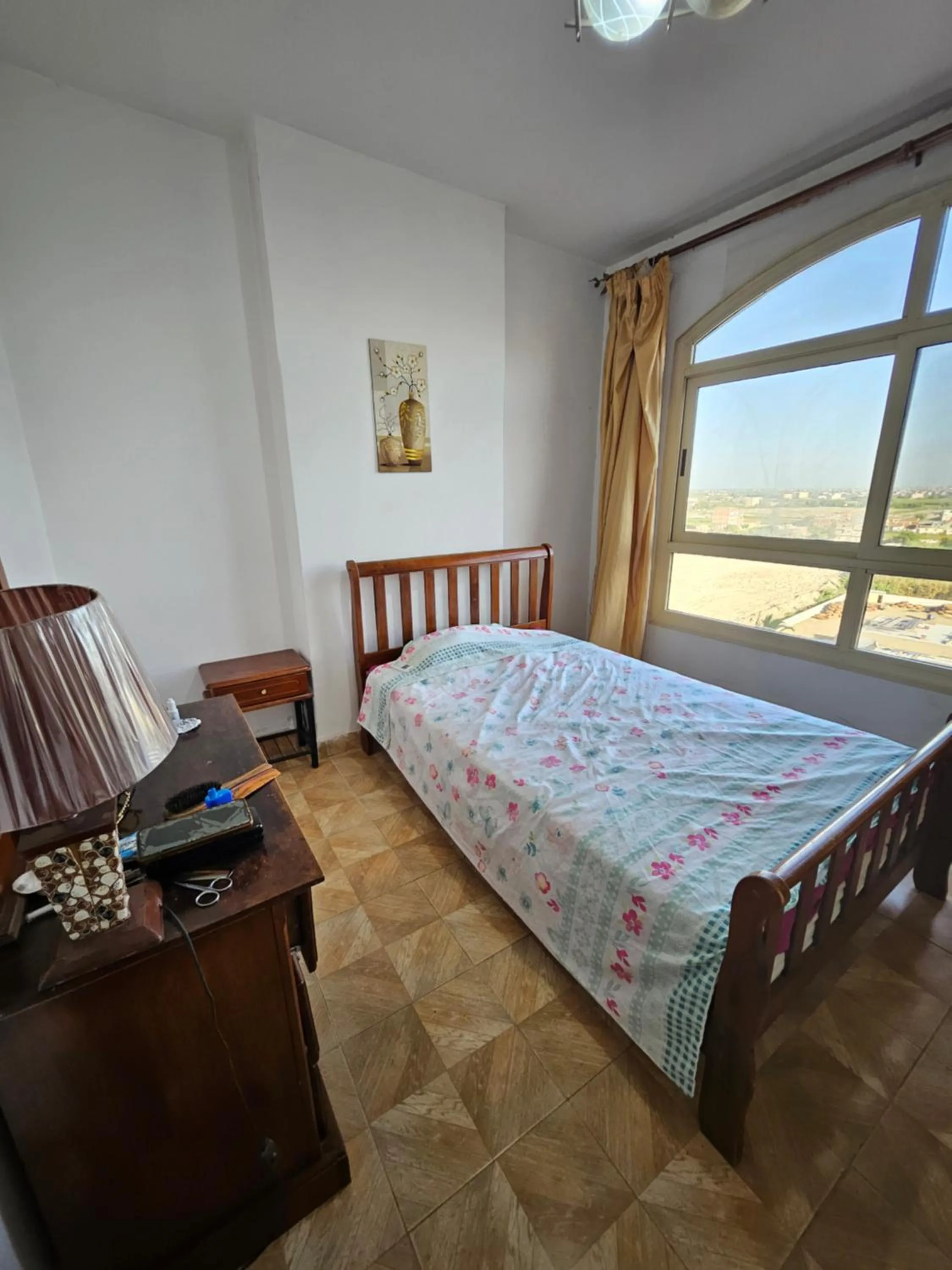 Bed in Flat in Royal Plaza Alexandria in front of El Montazah garden