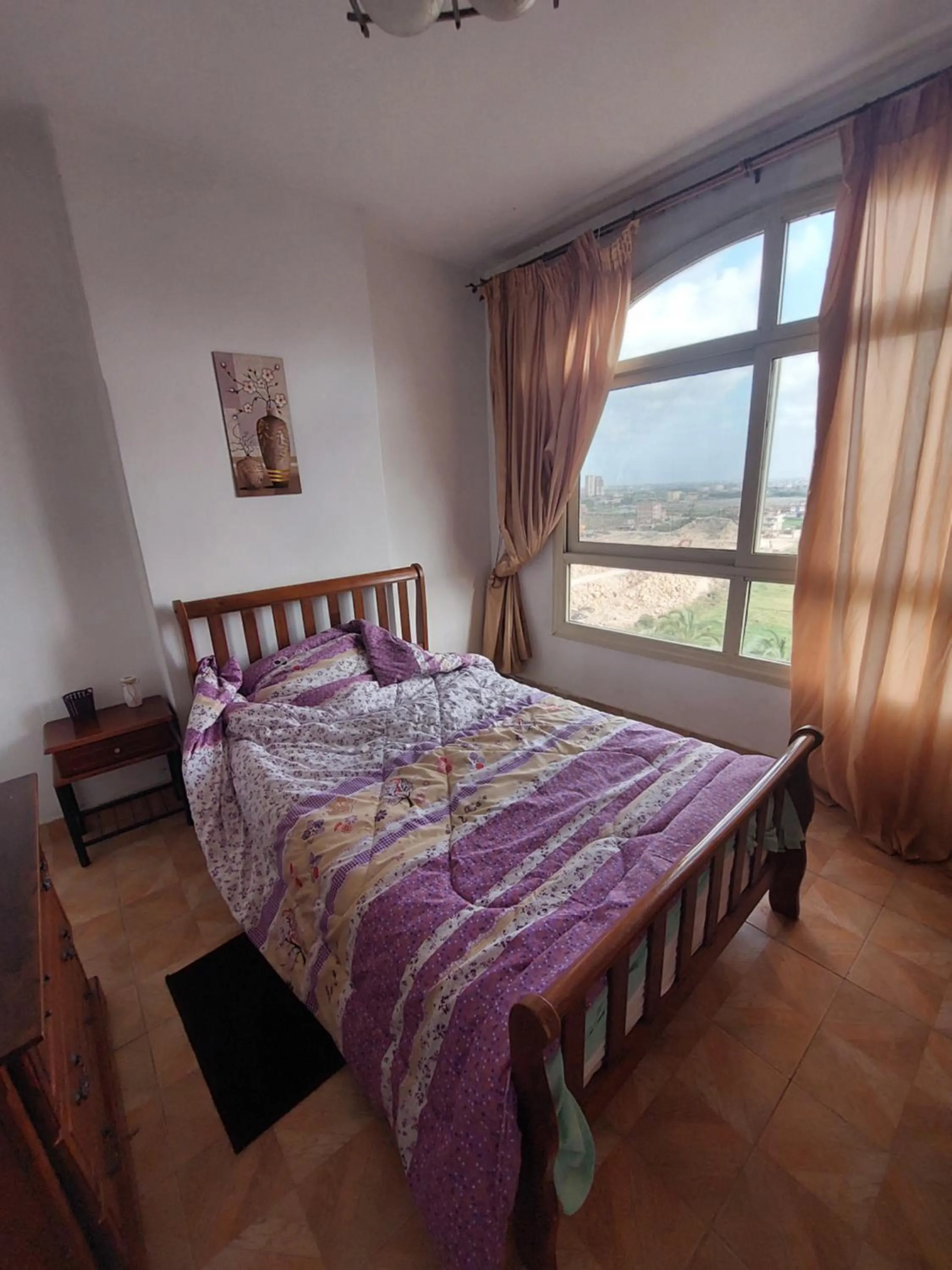 Bed in Flat in Royal Plaza Alexandria in front of El Montazah garden