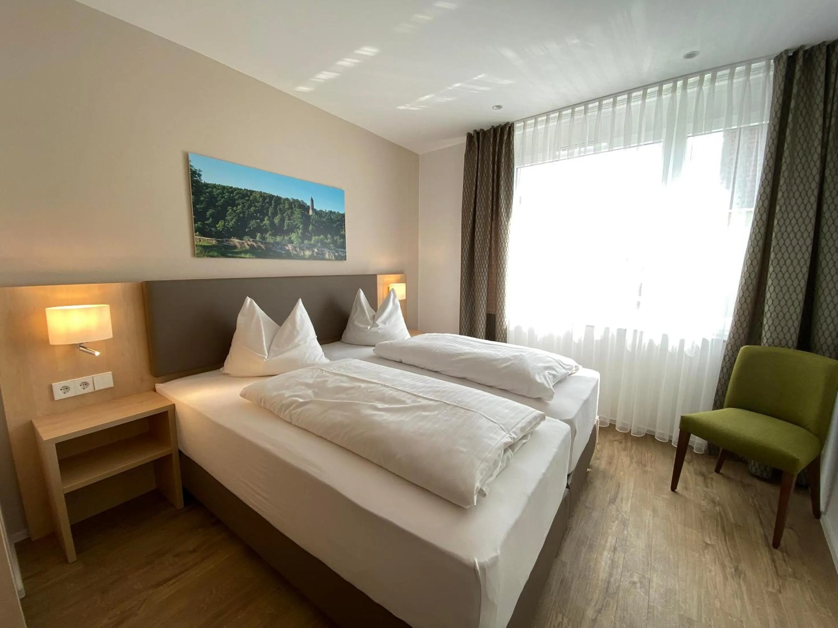 Bed in Hotel-Restaurant und Gästehaus Löwen