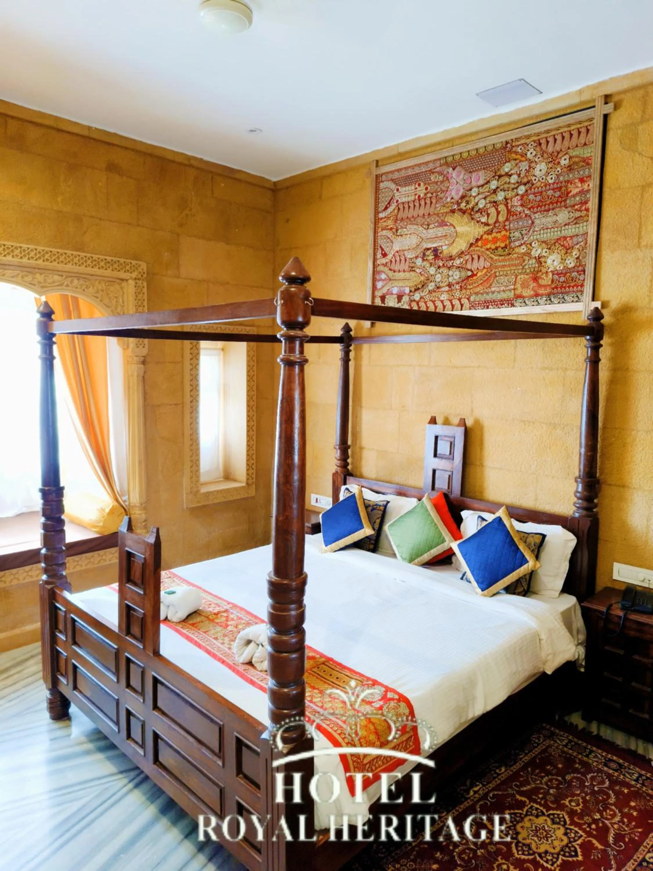 Bed in Hotel Royal Heritage