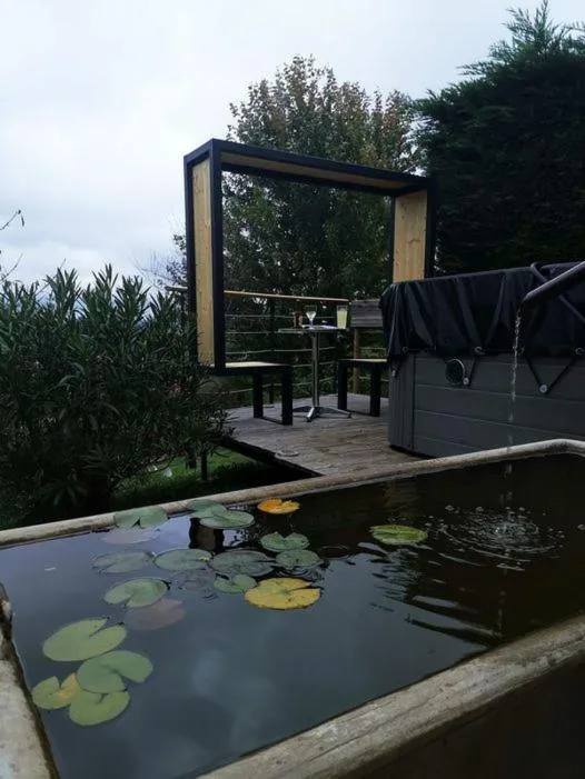 Garden view in Chambres au grand calme dans maison