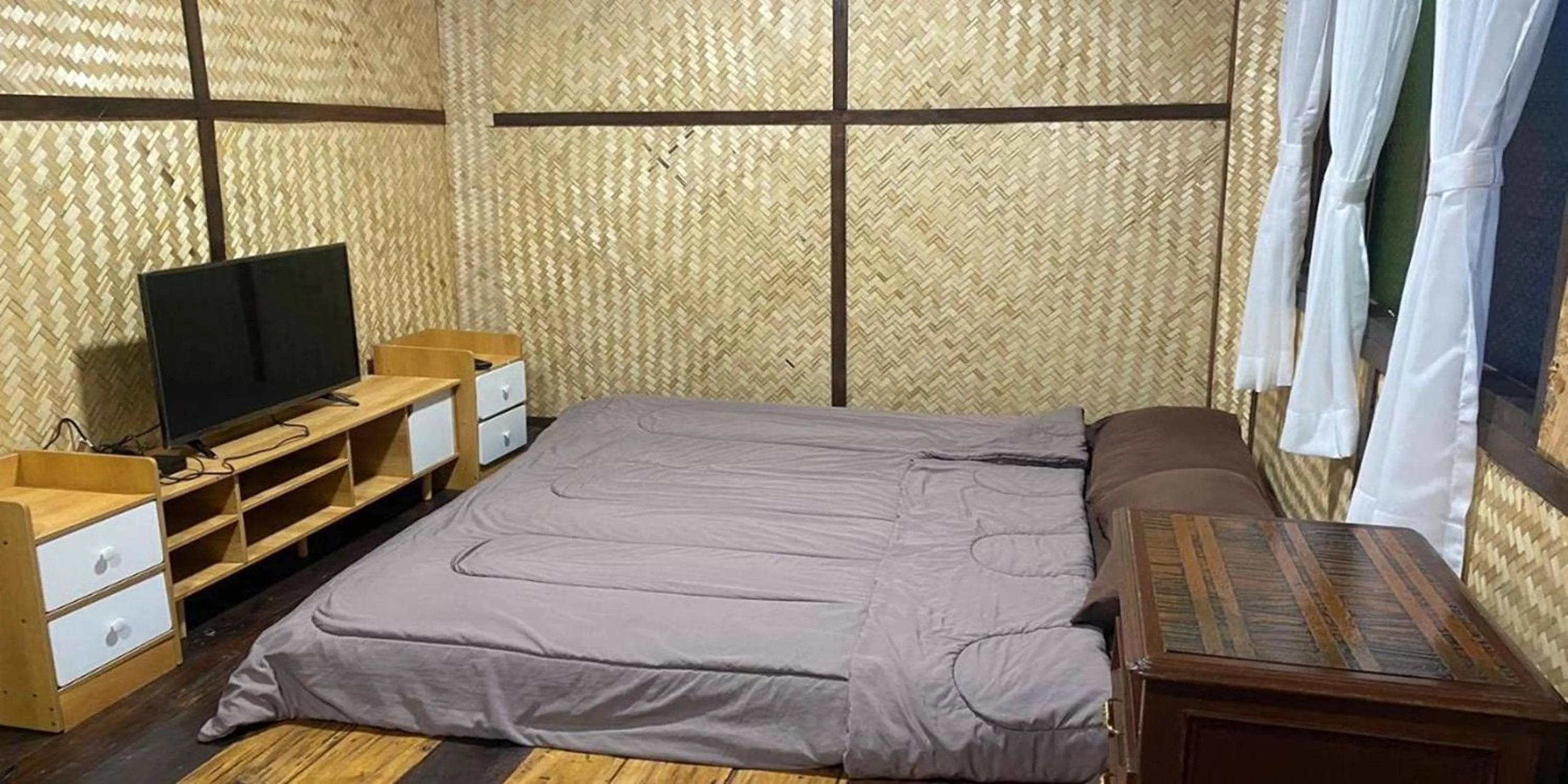 Bed in Nokkamin Home Chiang Dao