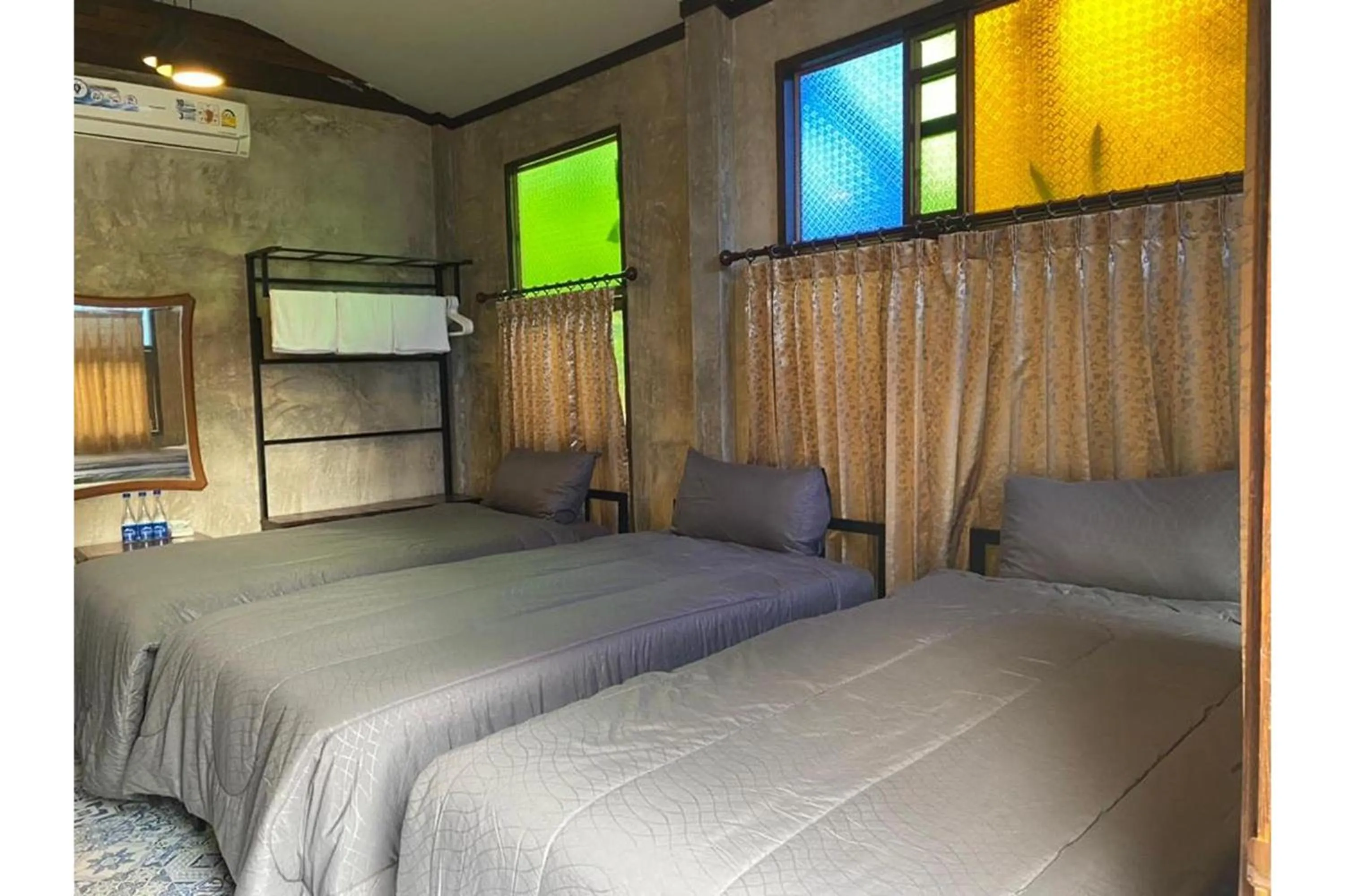 Bed in Nokkamin Home Chiang Dao