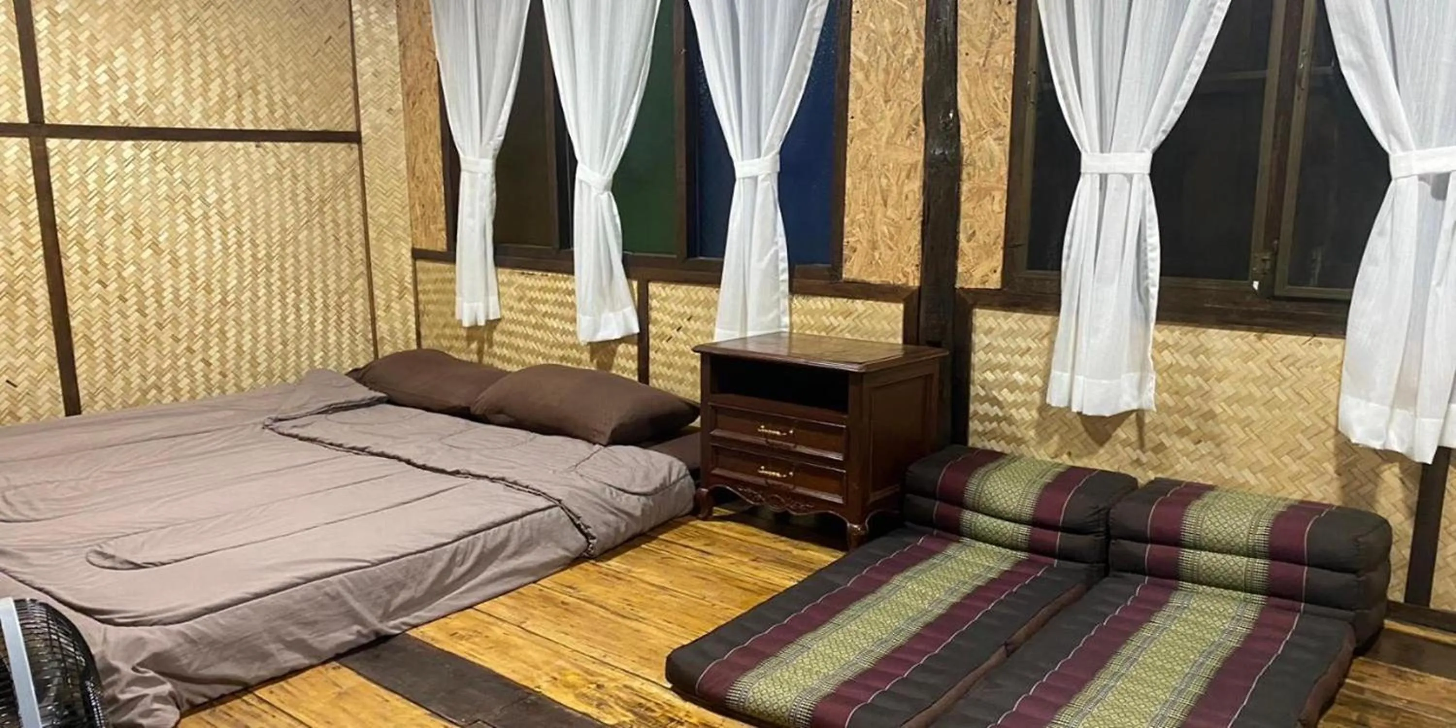 Bed in Nokkamin Home Chiang Dao