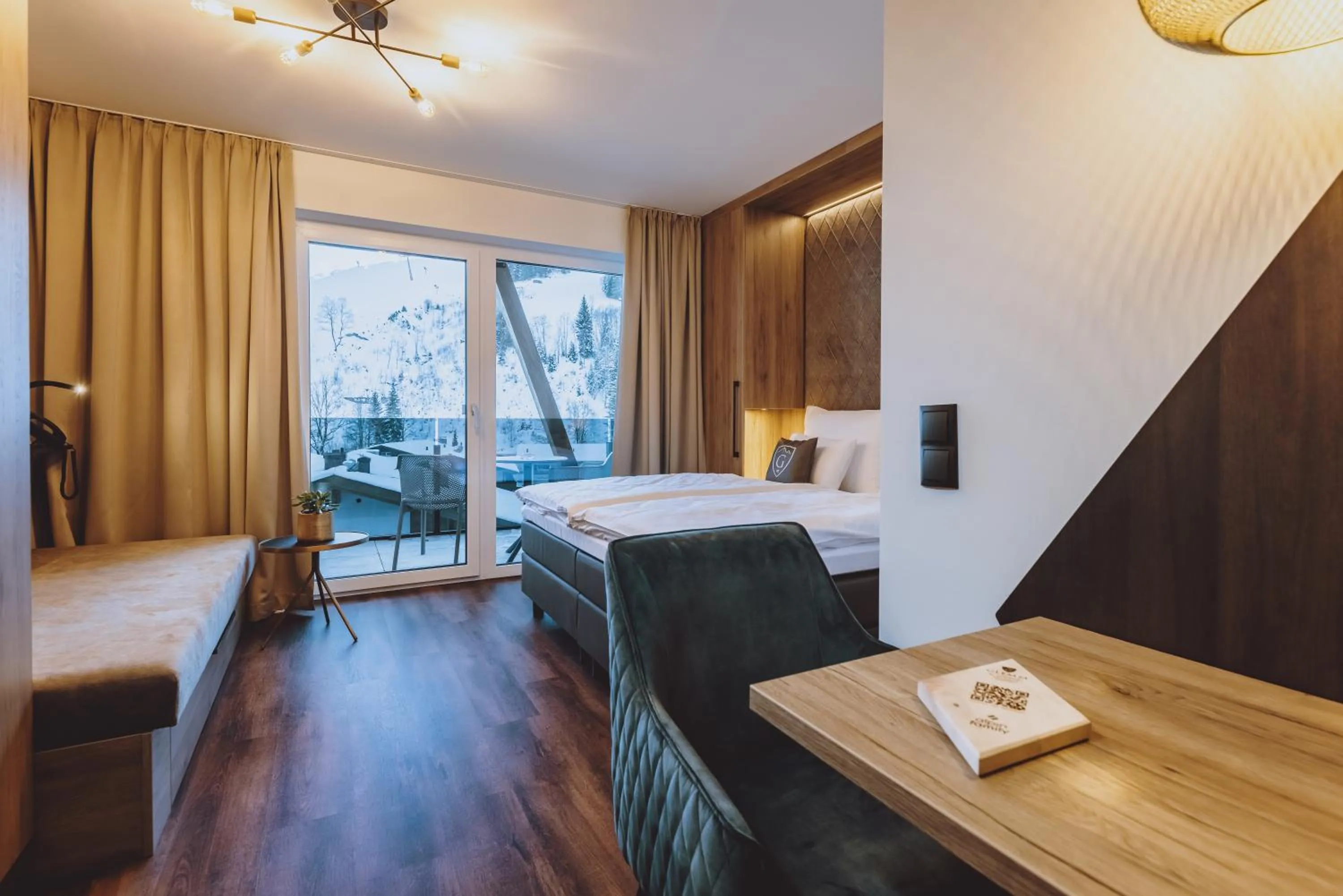 Photo of the whole room, Bed in GLEMM by AvenidA Superior Hotel & Residences