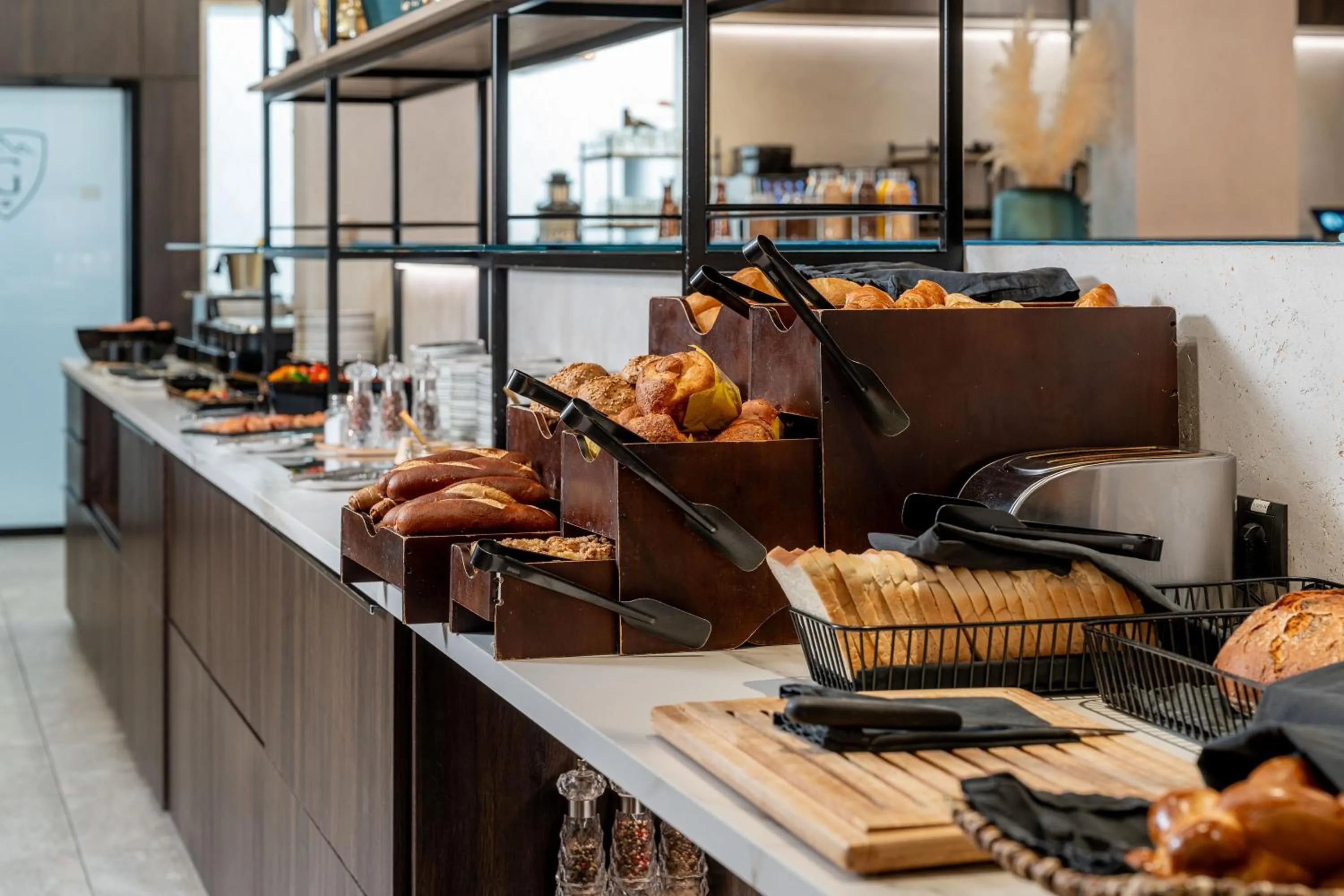 Buffet breakfast in GLEMM by AvenidA Superior Hotel & Residences