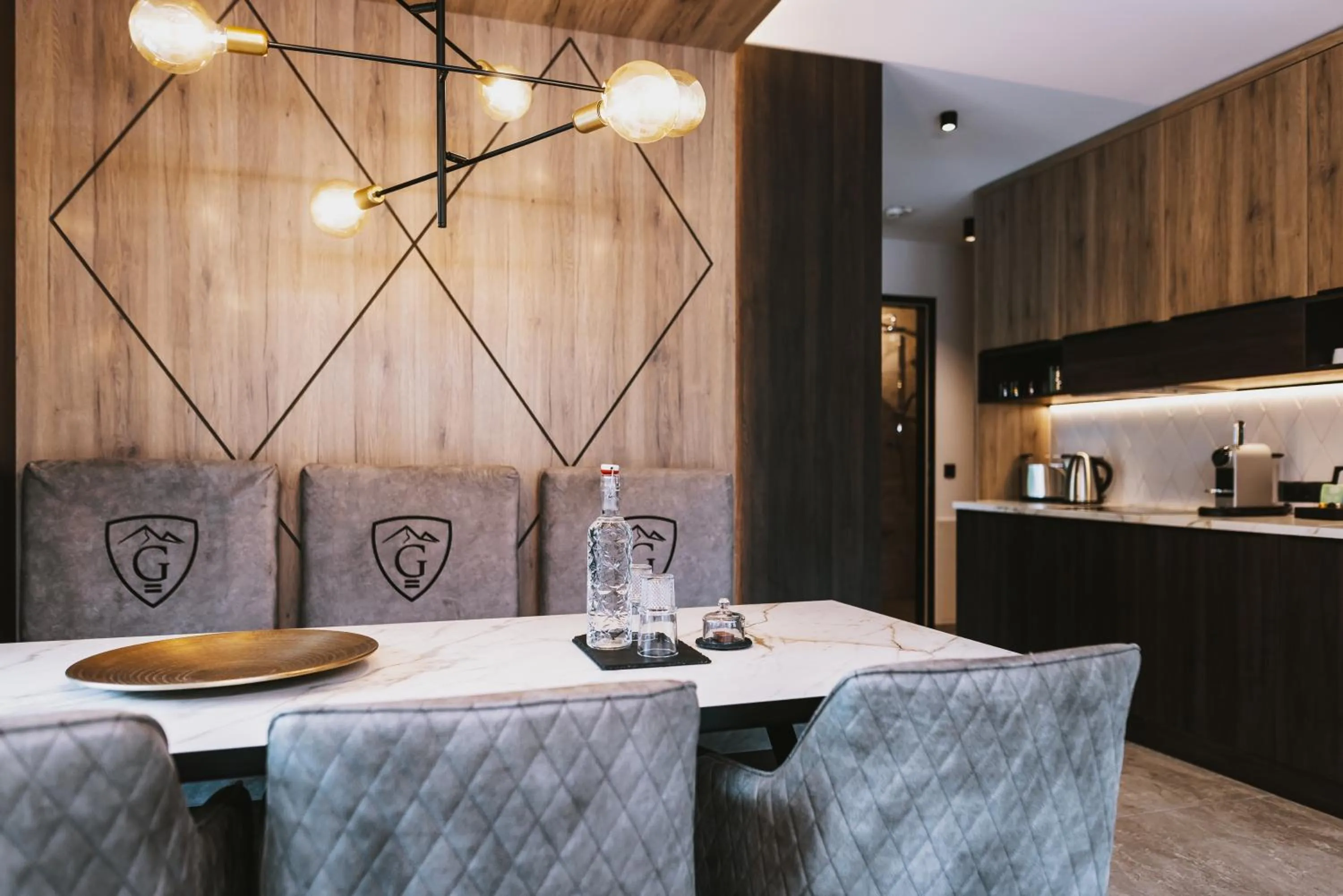 Seating area in GLEMM by AvenidA Superior Hotel & Residences