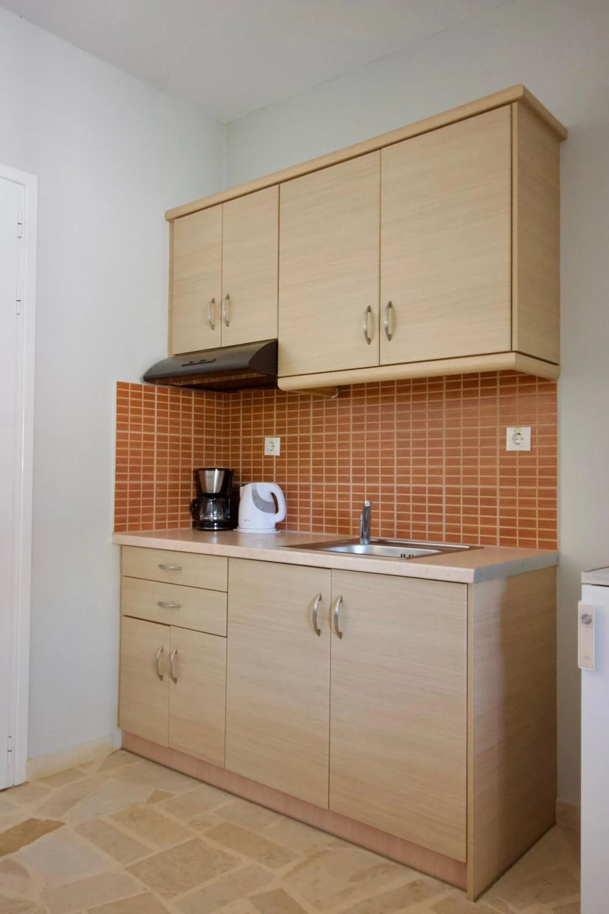 kitchen in Aggelina's Apartments