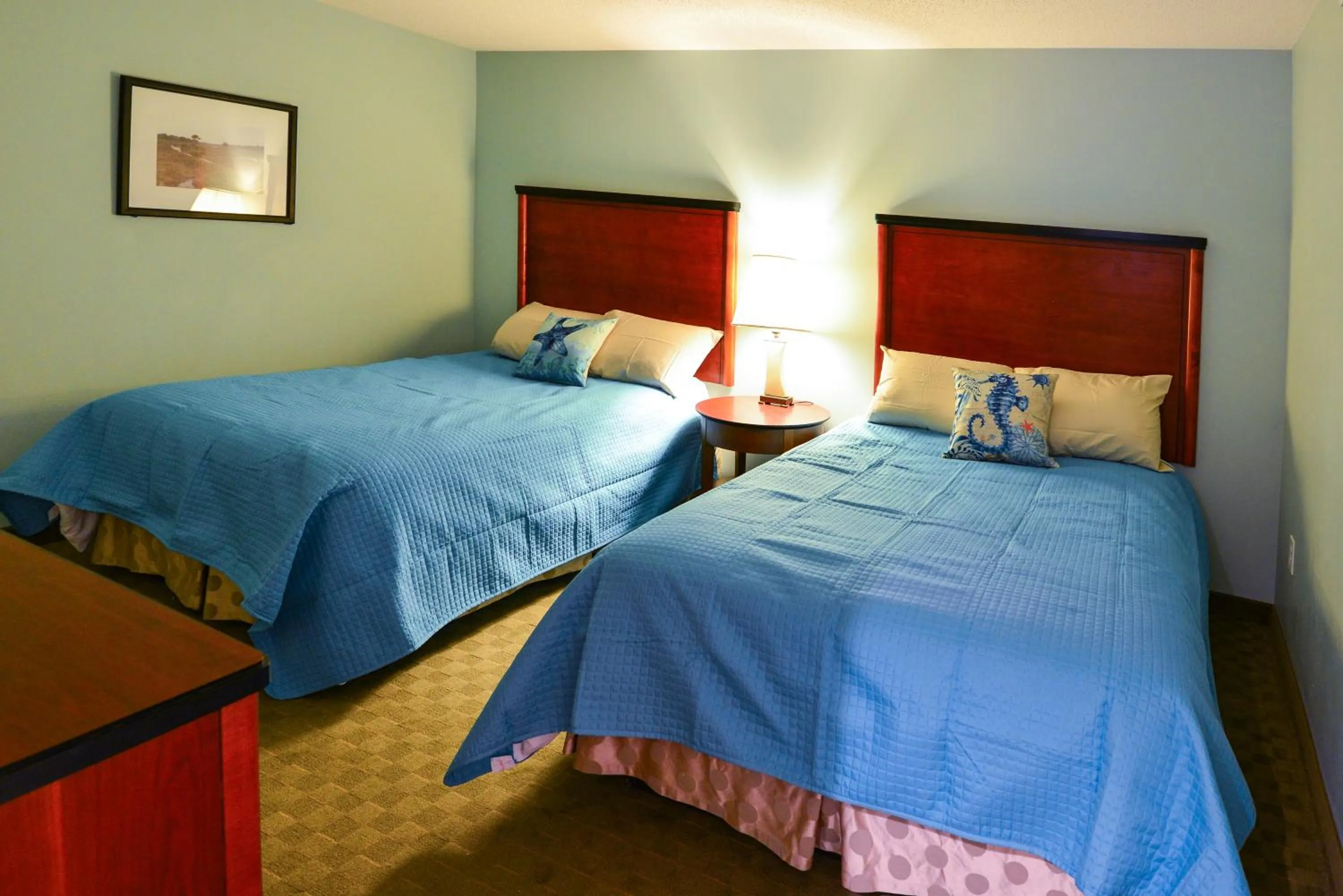 Bed in Deluxe Ocean Front Two-Bedroom Condo in Sandy Beach Resort