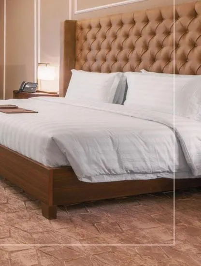 Bed in فندق سكناي رويال - Suknai Royal Hotel
