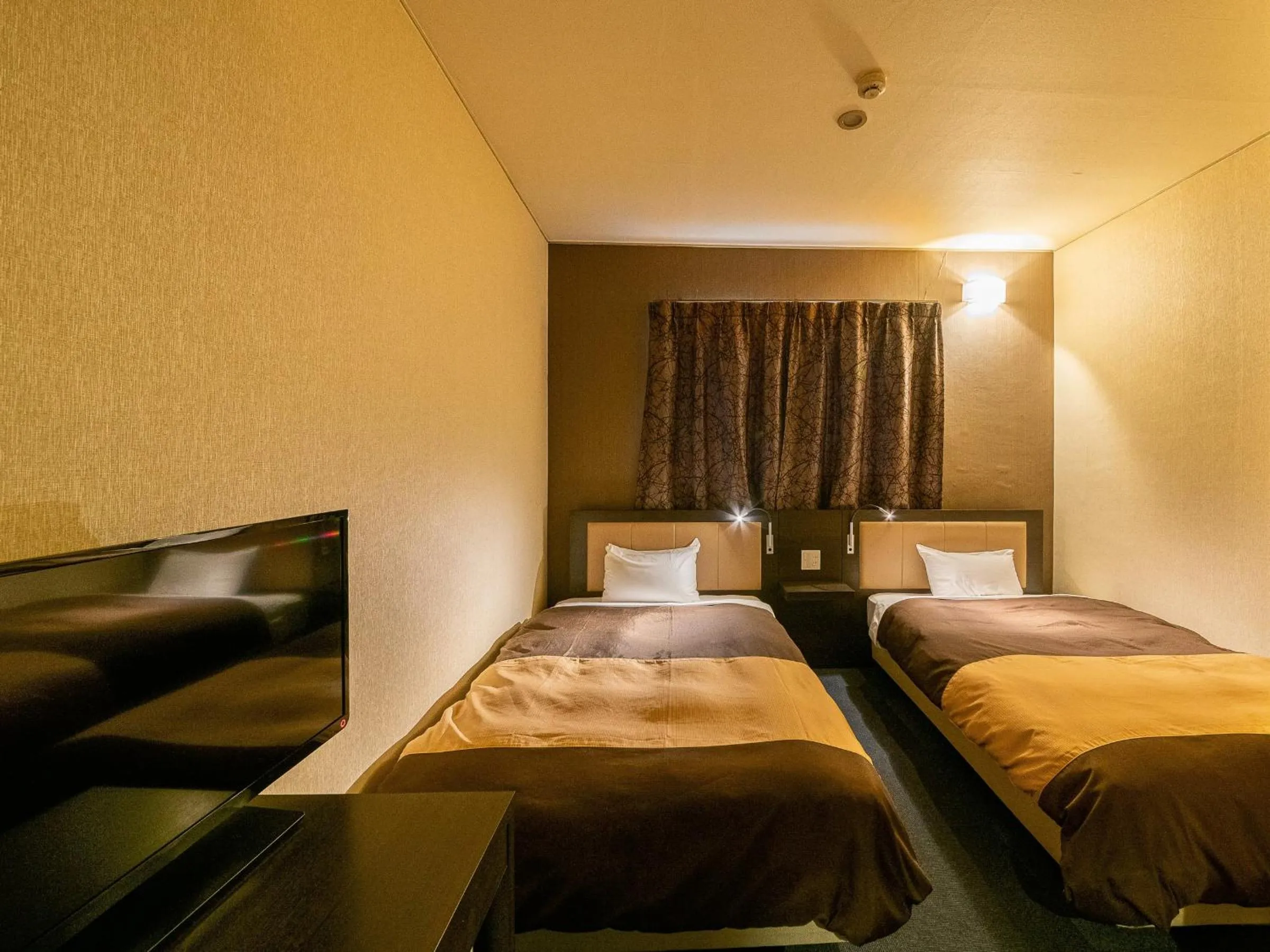 Bed in Kyoto Central Inn