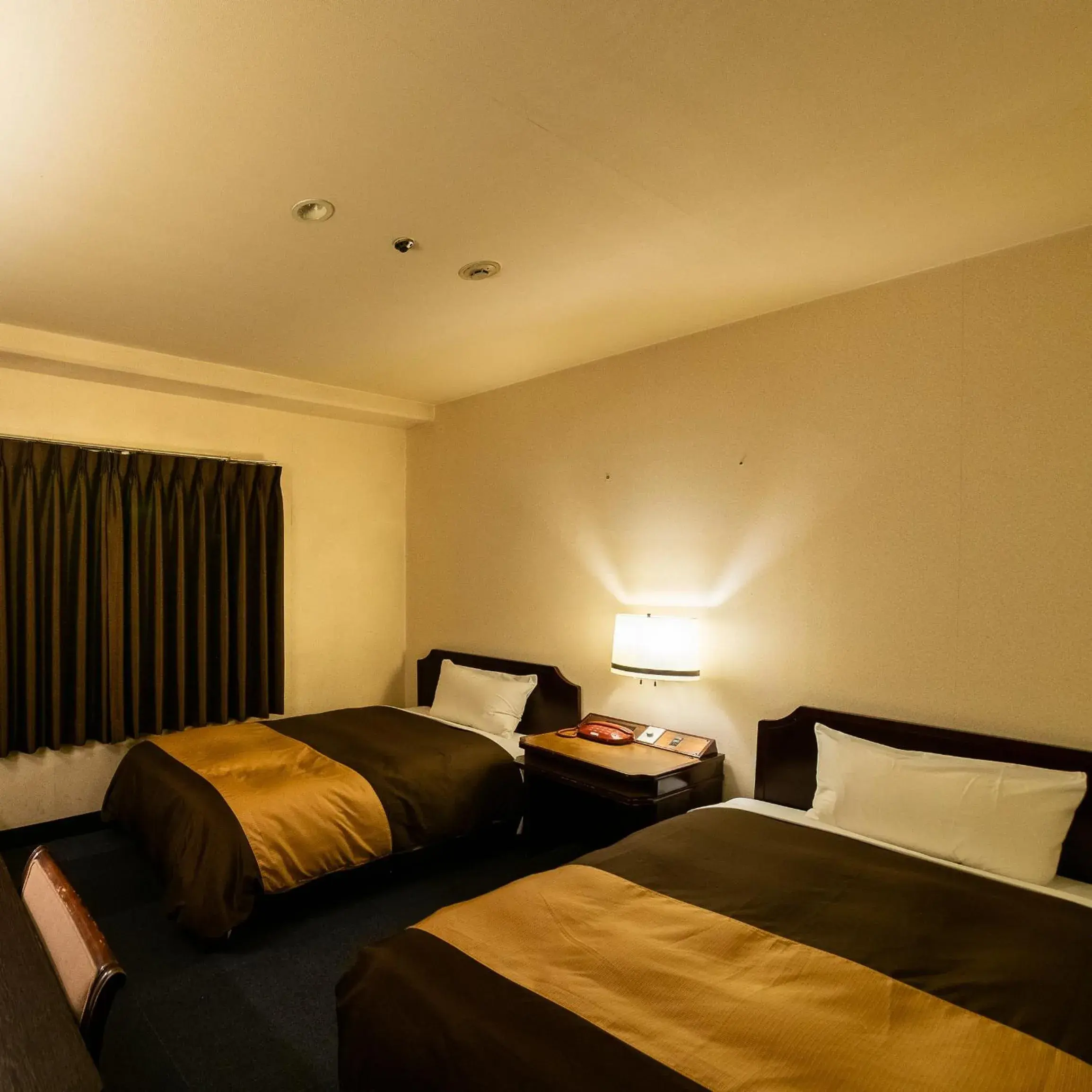 Bed in Kyoto Central Inn Bed in Kyoto Central Inn