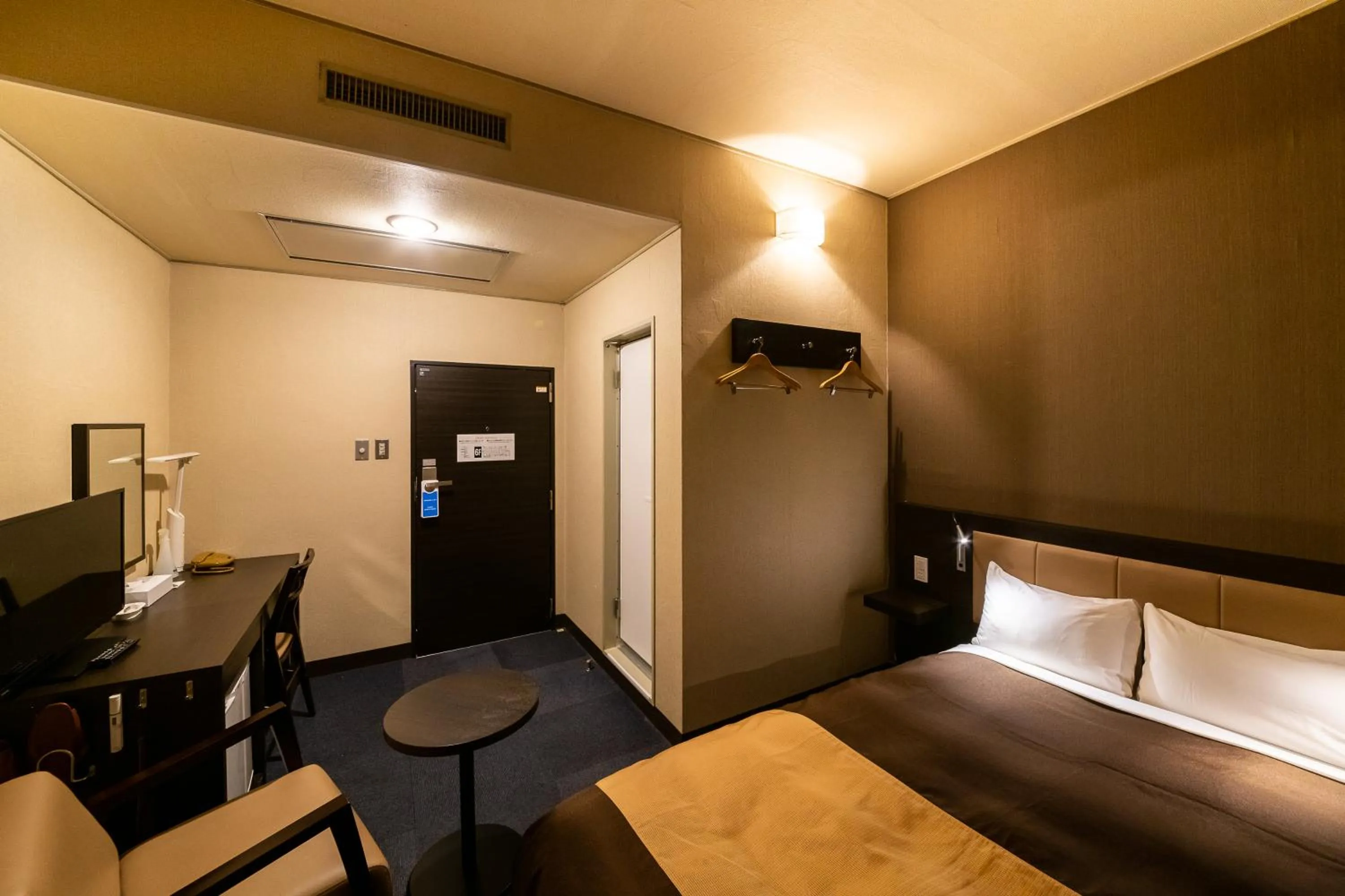 Bed in Kyoto Central Inn