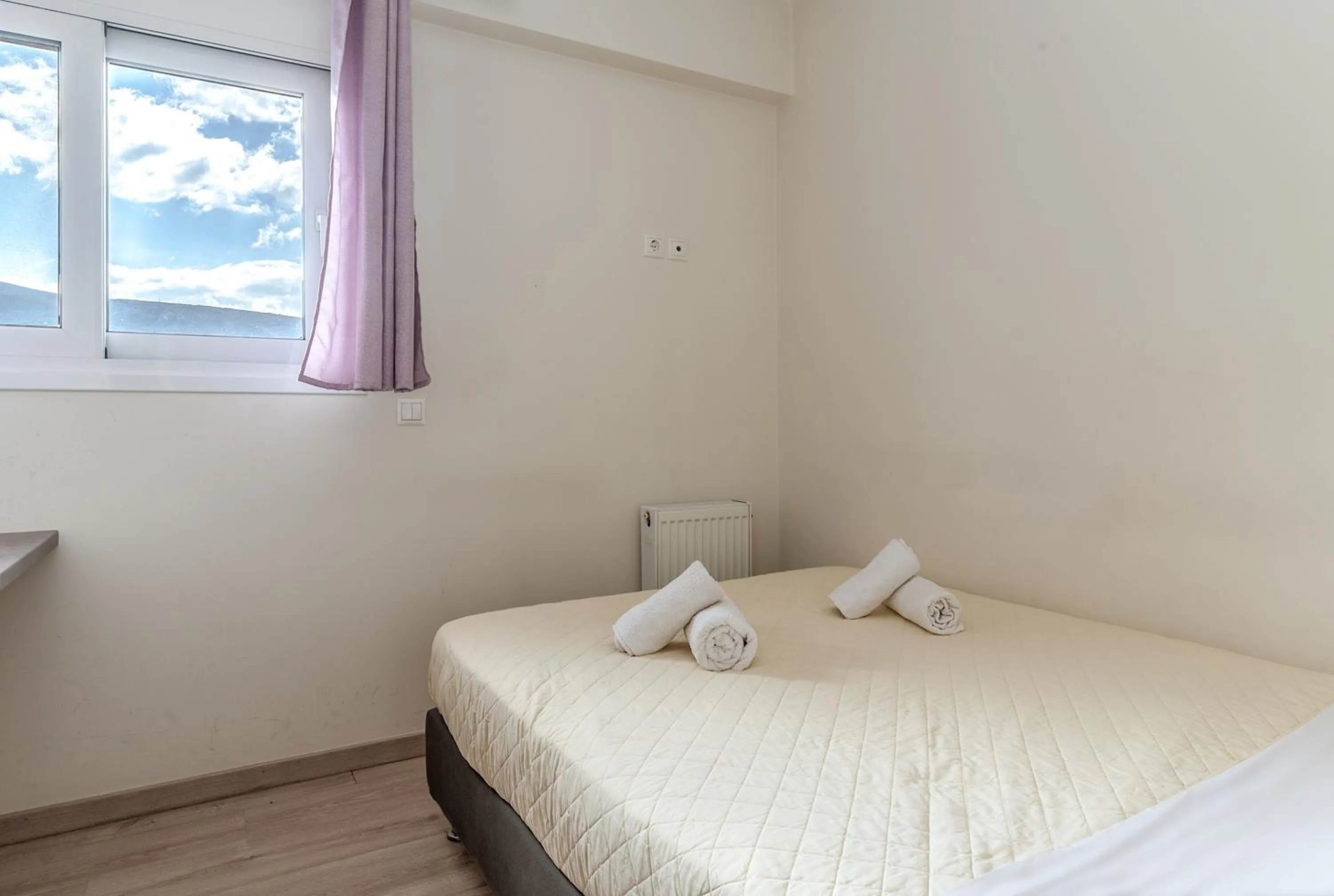 Bedroom, Bed in Elvita Apartments 3