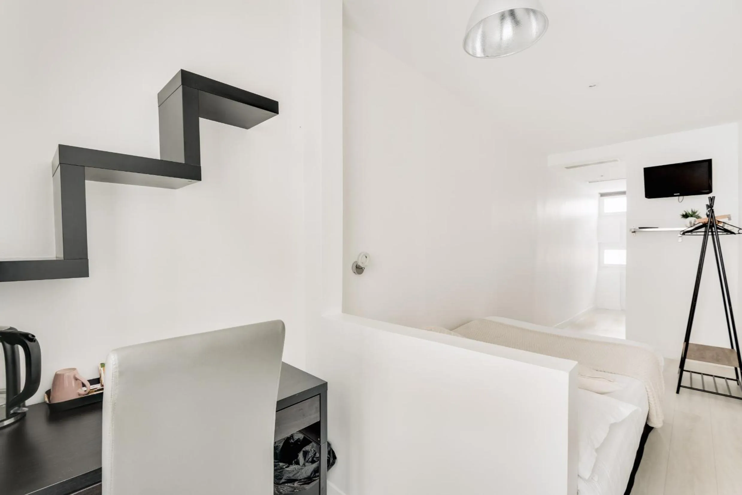 Bed in L'Oasis Montparnasse