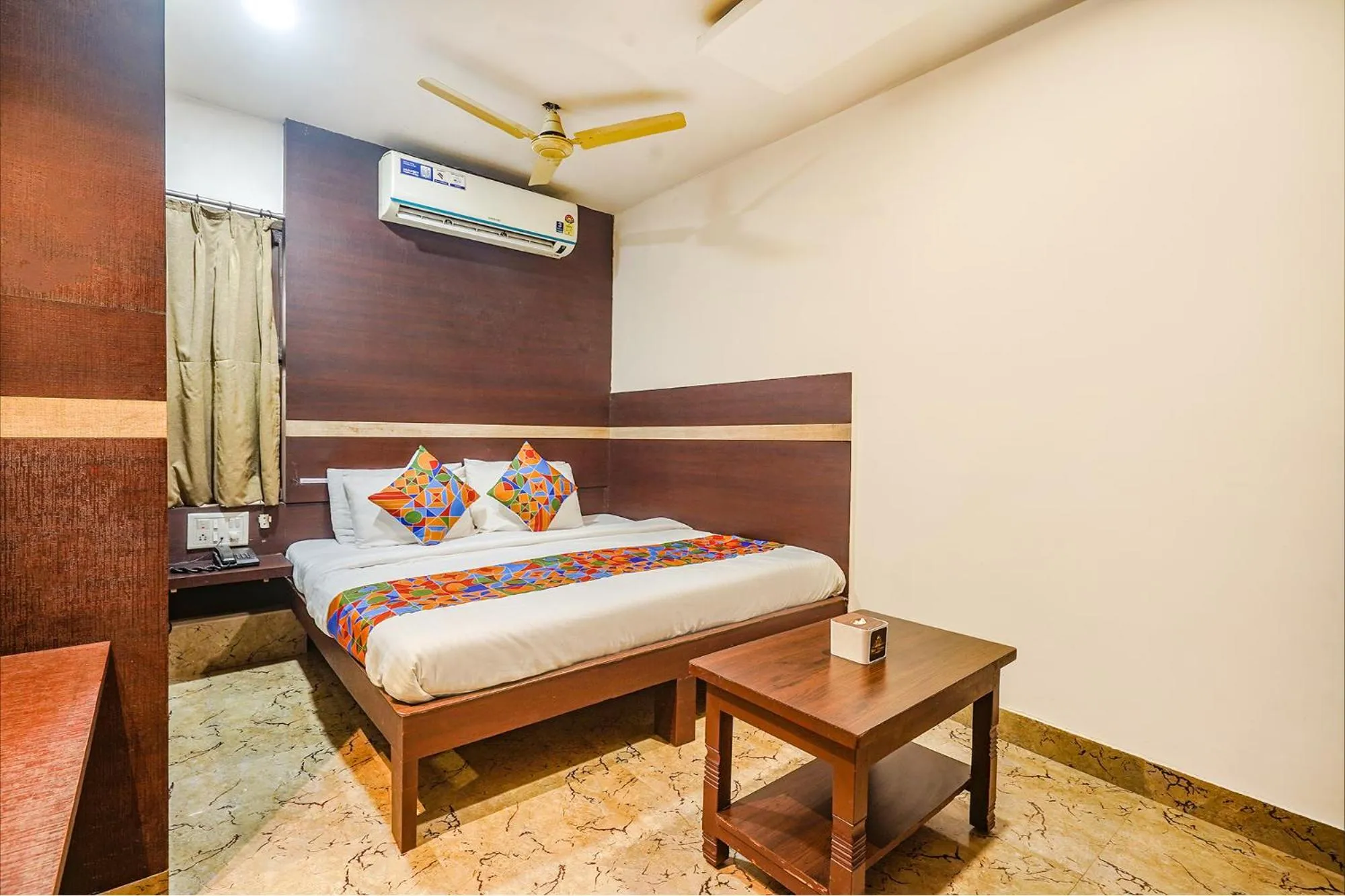 Bed in FabHotel Shravan - Nr Eternity Mall