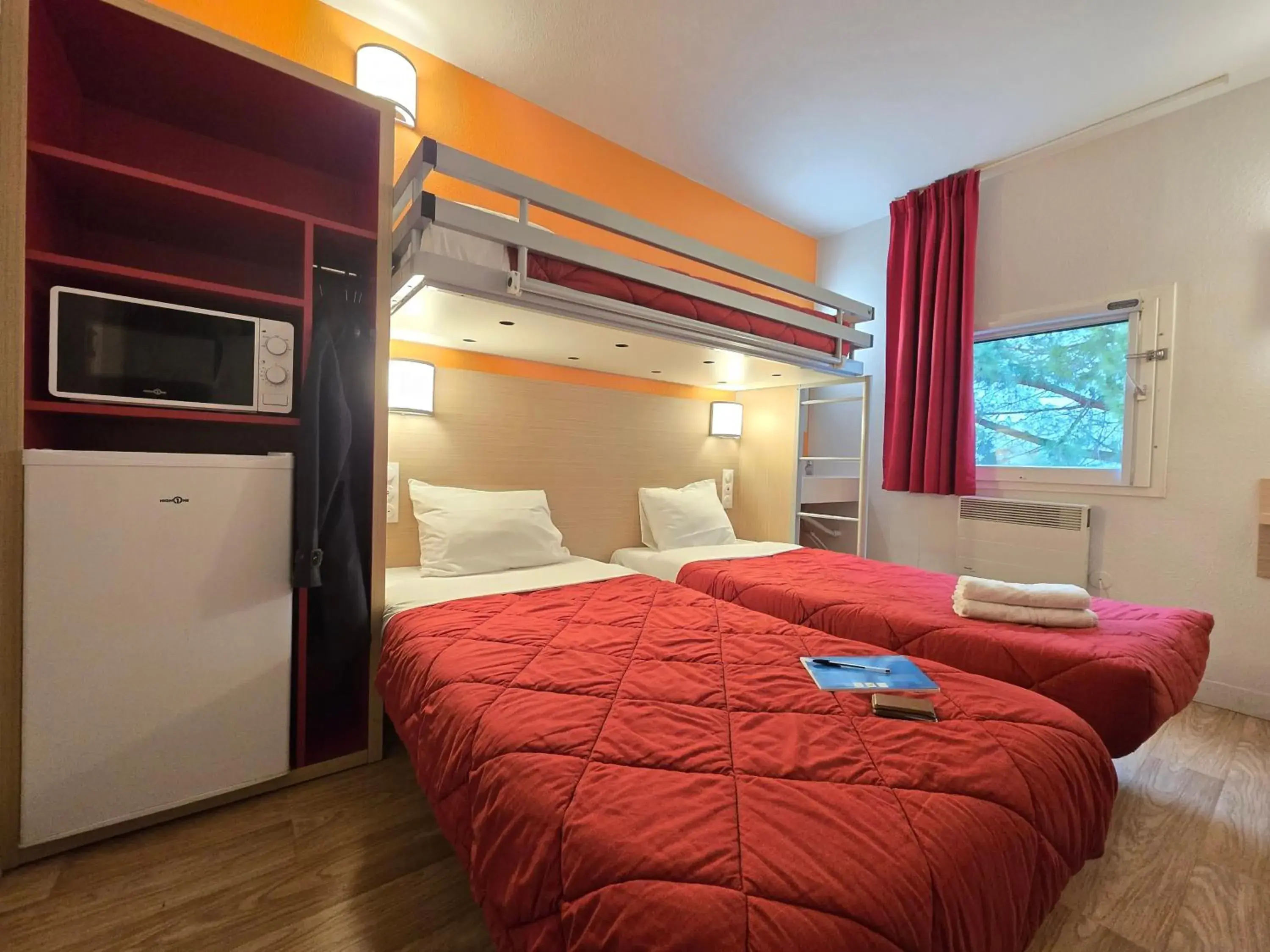 Triple Room with Three Single Beds and Shared Bathroom/Toilet in Premiere Classe Paris Nord - Sarcelles Triple Room with Three Single Beds and Shared Bathroom/Toilet in Premiere Classe Paris Nord - Sarcelles