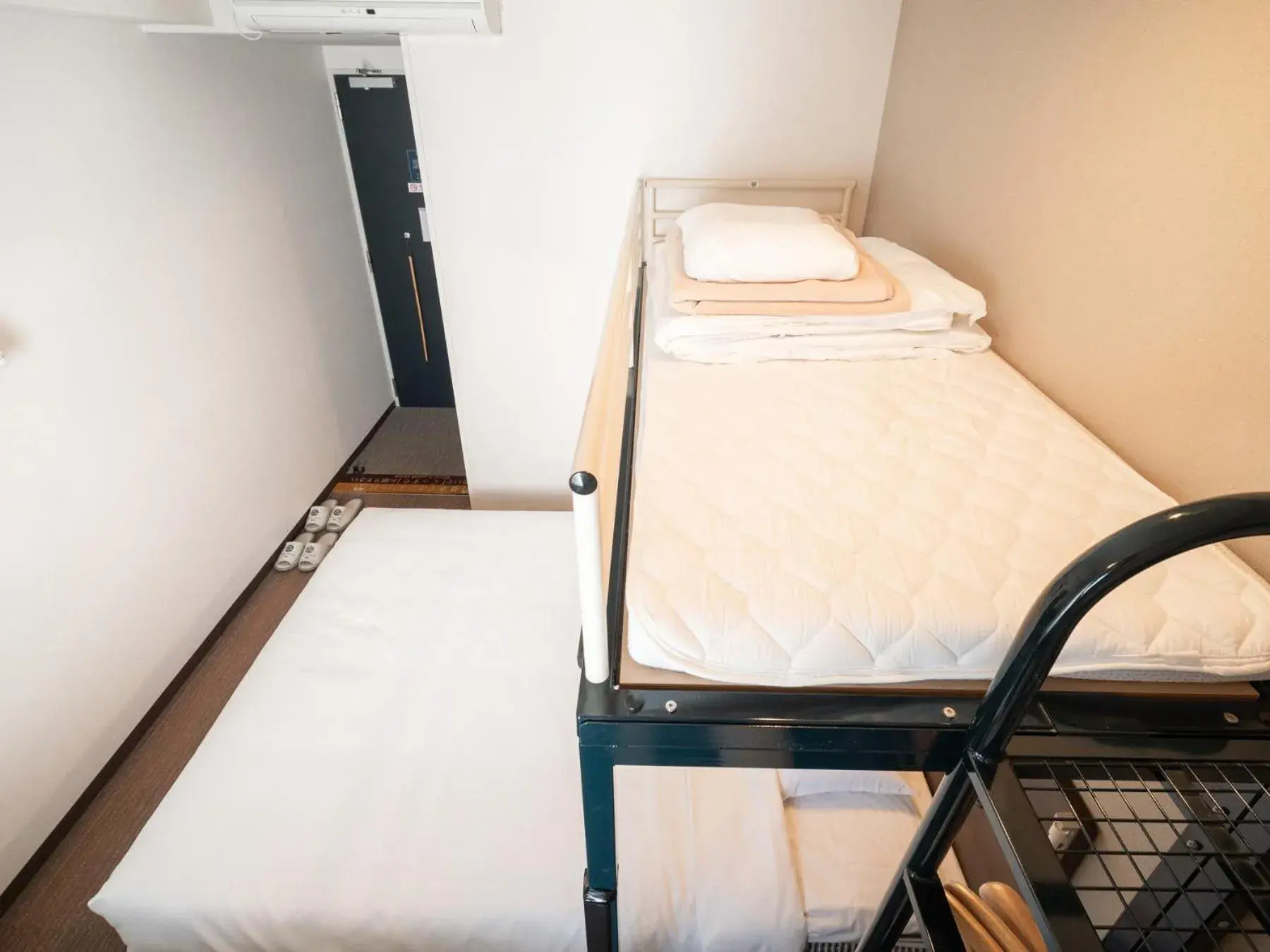 Bed in Super Hotel JR Fujiekimae Kinenkan Bed in Super Hotel JR Fujiekimae Kinenkan