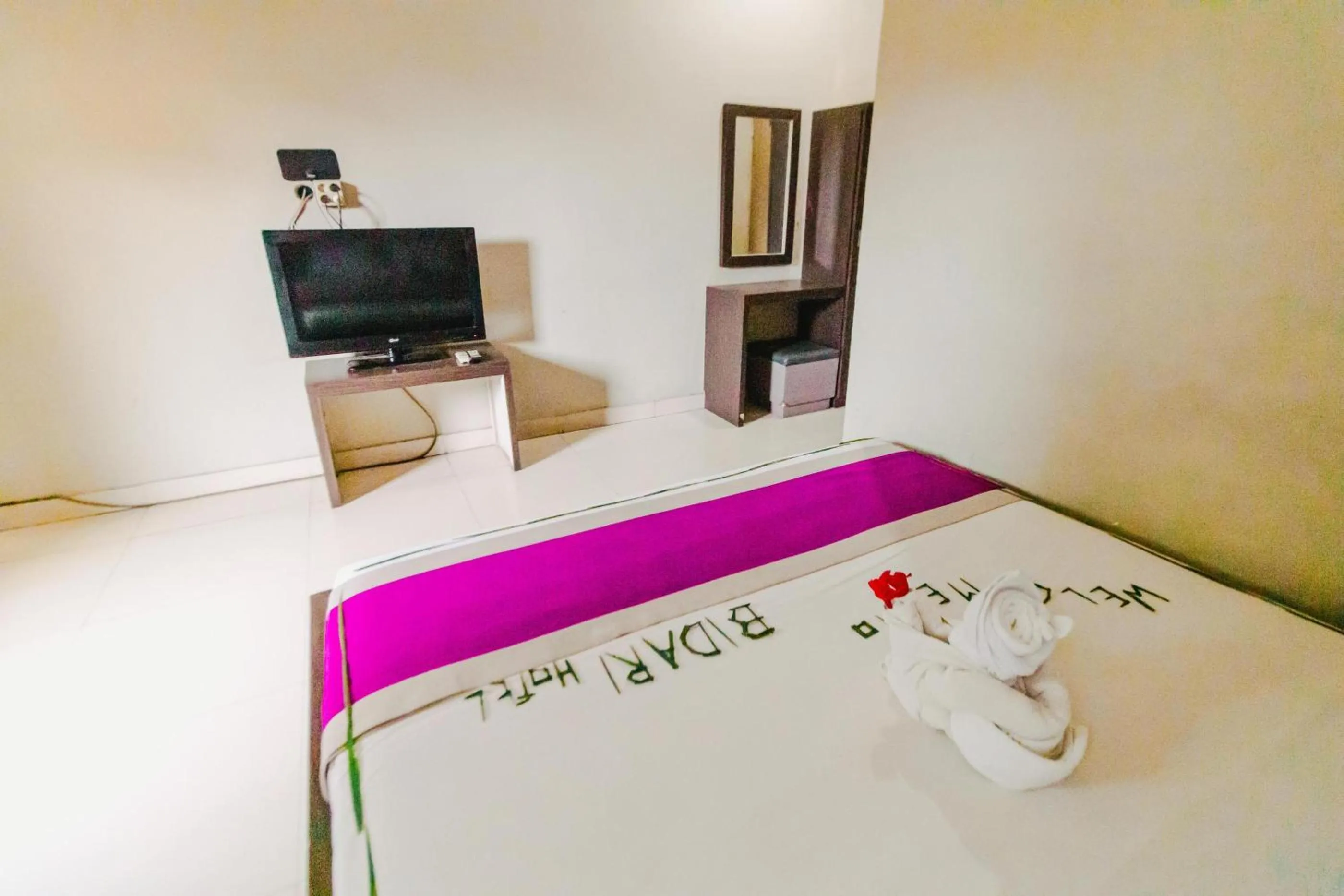 Bed in Bidari Hotel Lombok