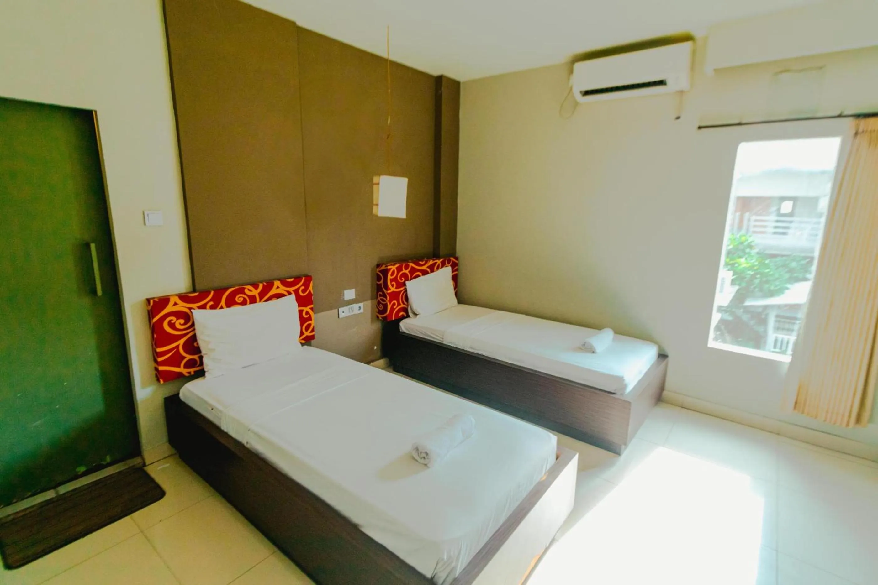 Bed in Bidari Hotel Lombok