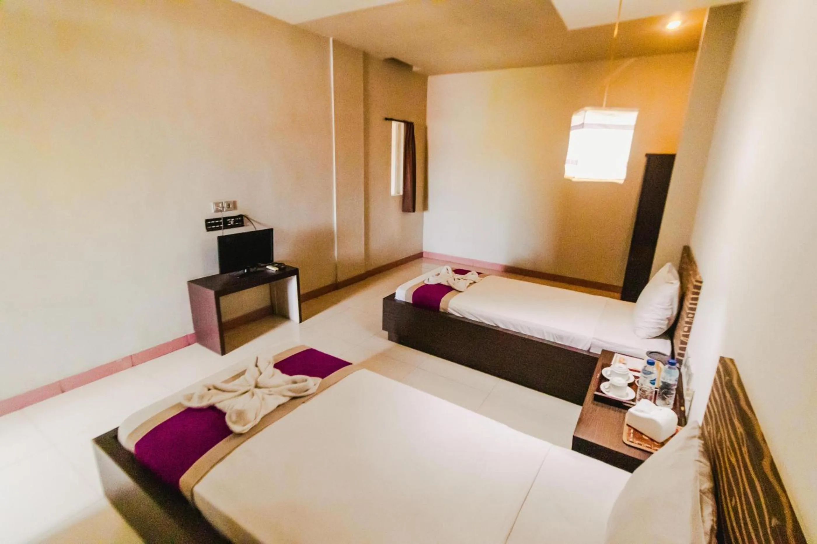 Bed in Bidari Hotel Lombok