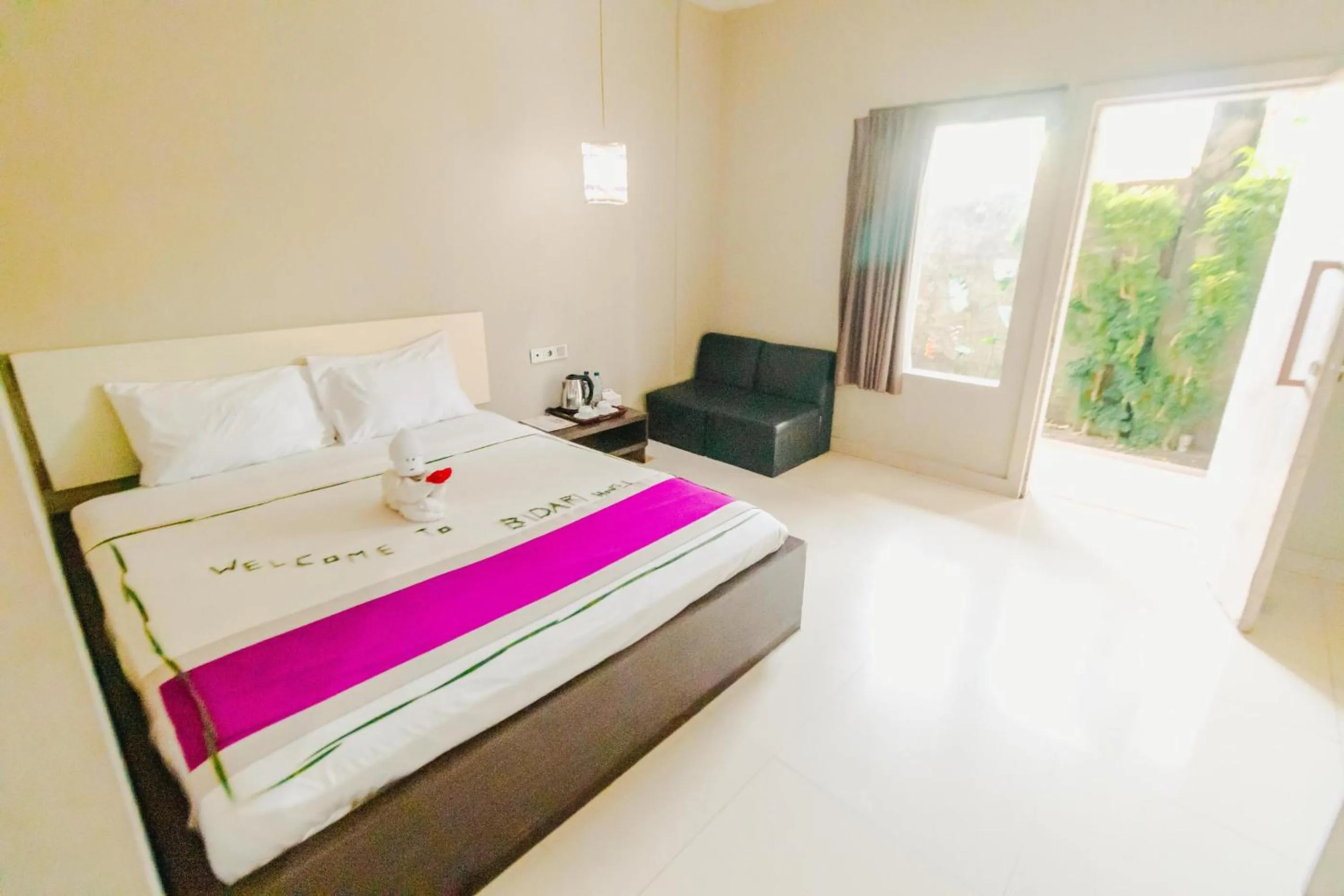 Bed in Bidari Hotel Lombok