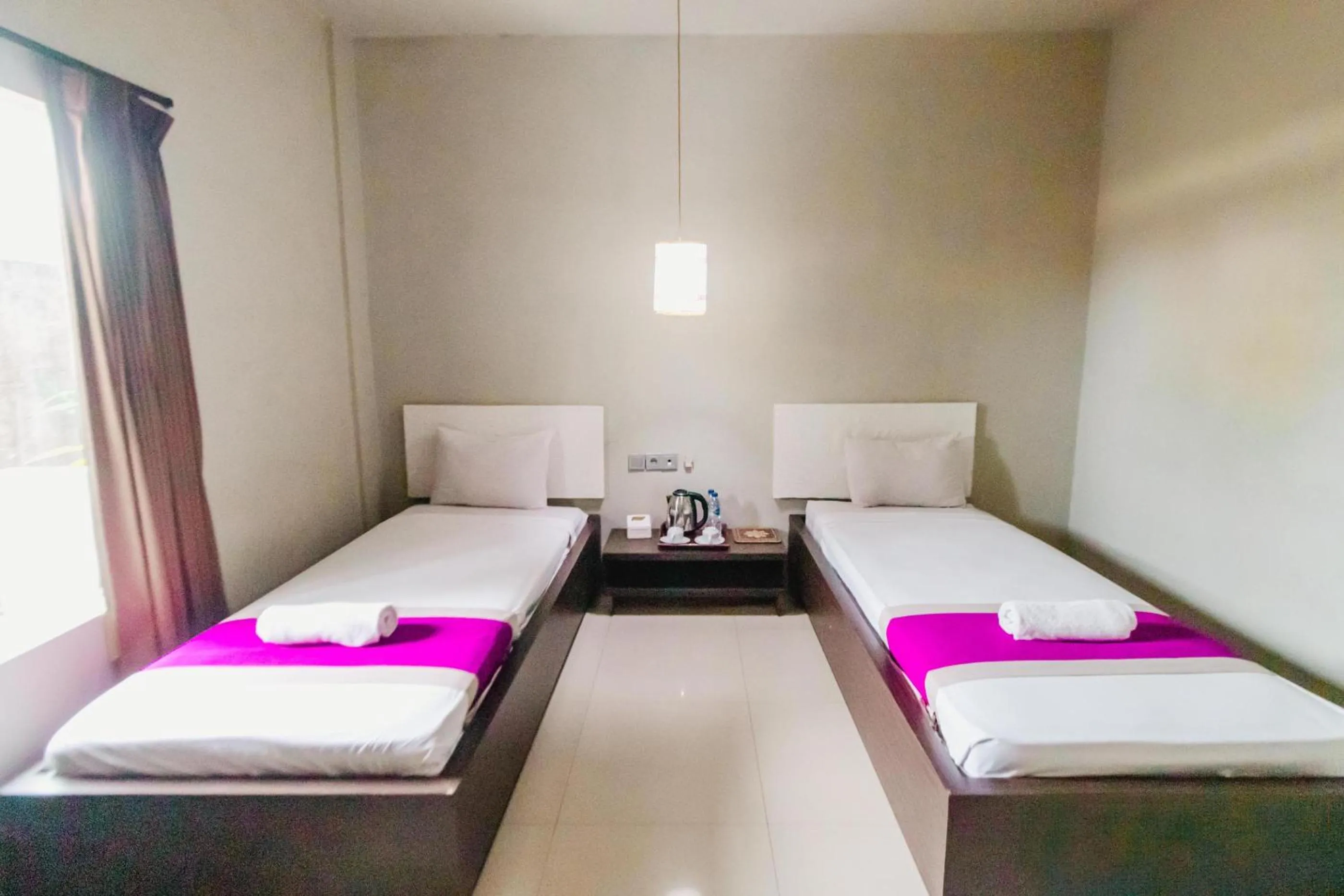 Bed in Bidari Hotel Lombok