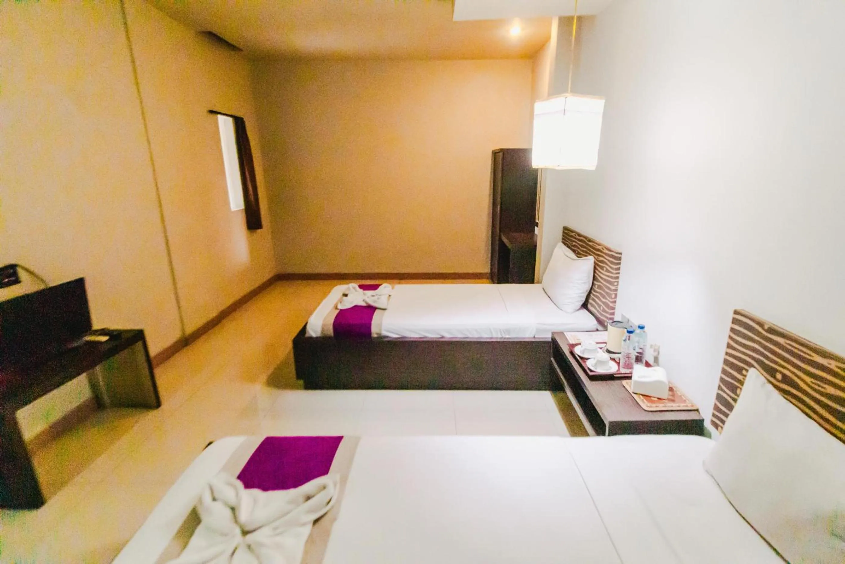 Bed in Bidari Hotel Lombok