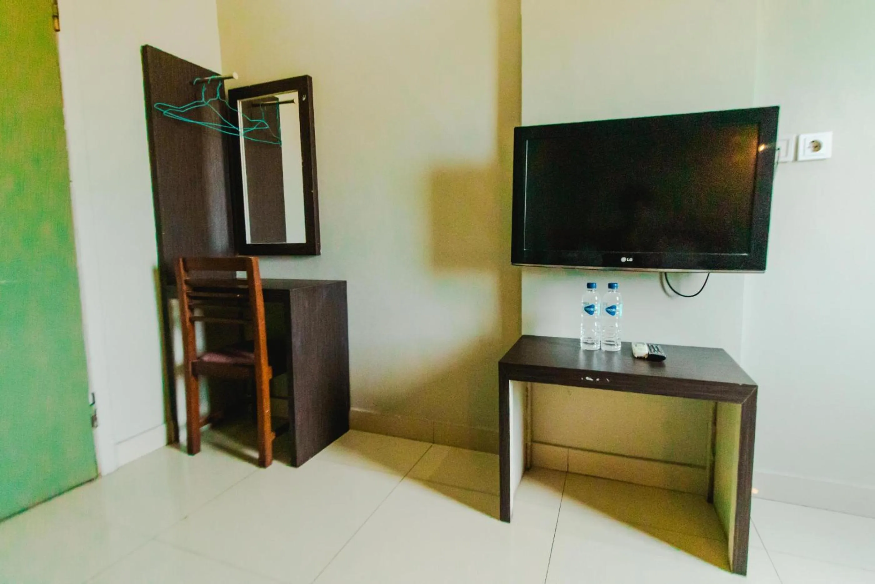 Communal lounge/ TV room in Bidari Hotel Lombok