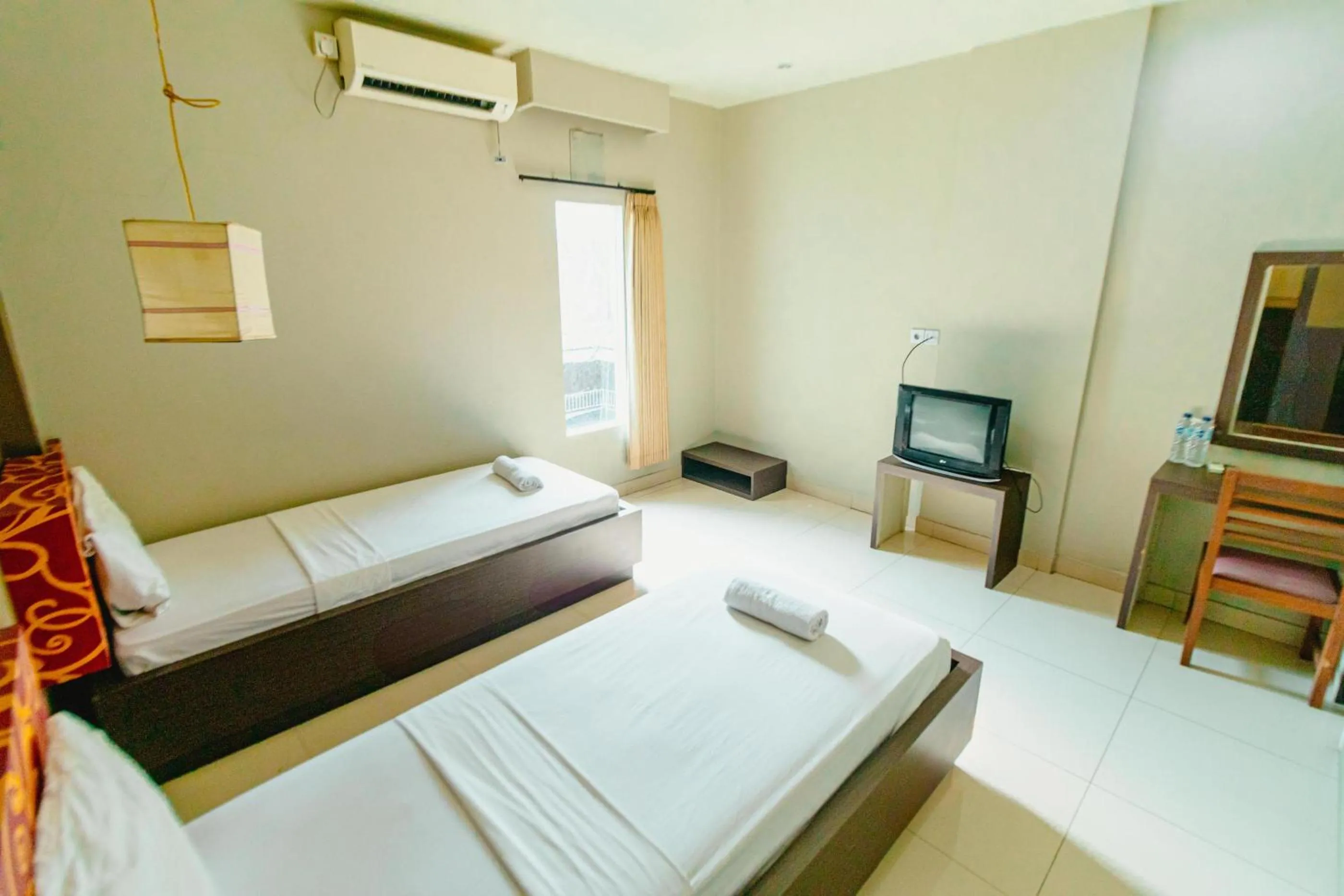 Bed in Bidari Hotel Lombok