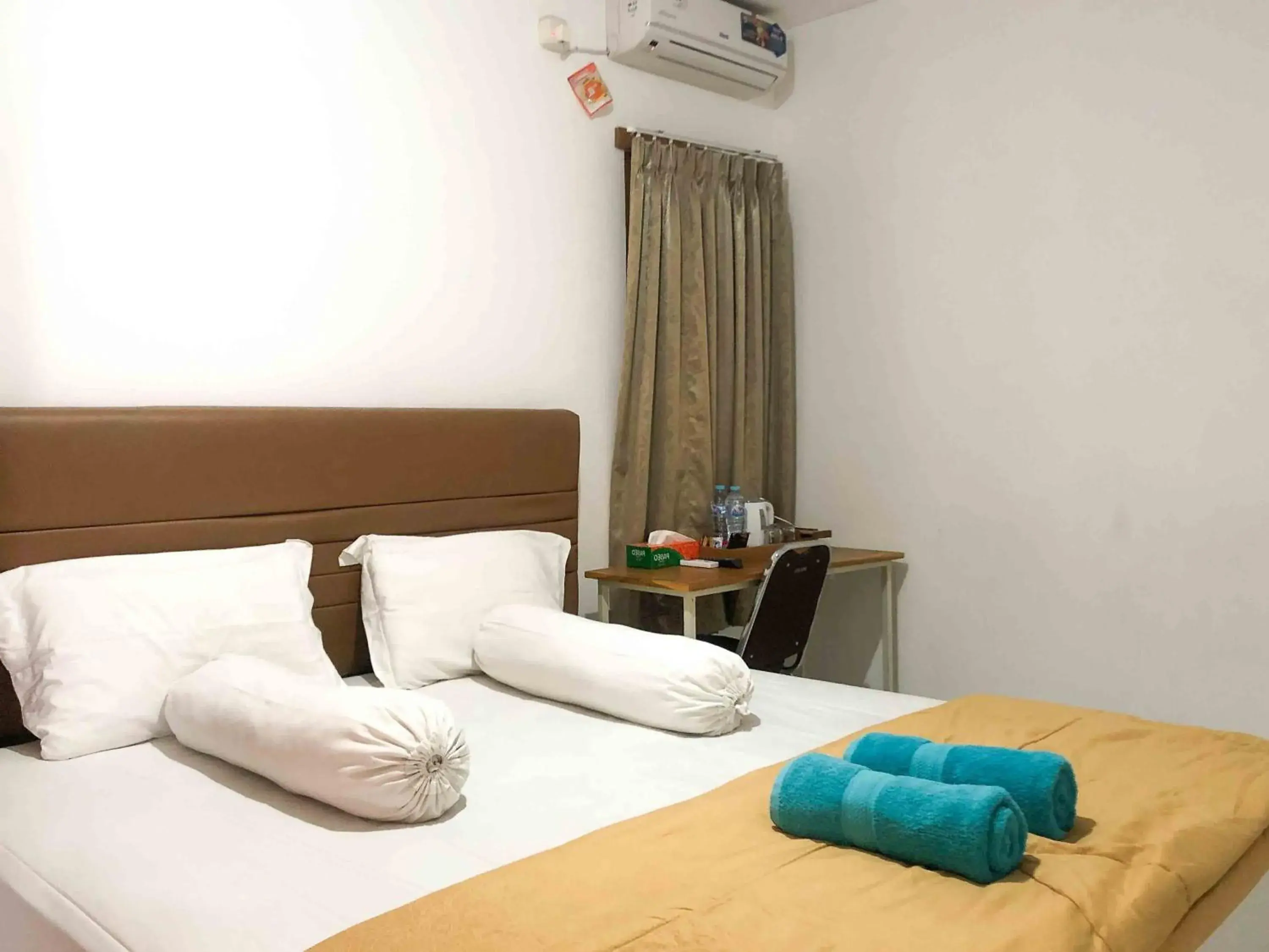 Bed in Sofia Residence Syariah Mitra RedDoorz Bed in Sofia Residence Syariah Mitra RedDoorz