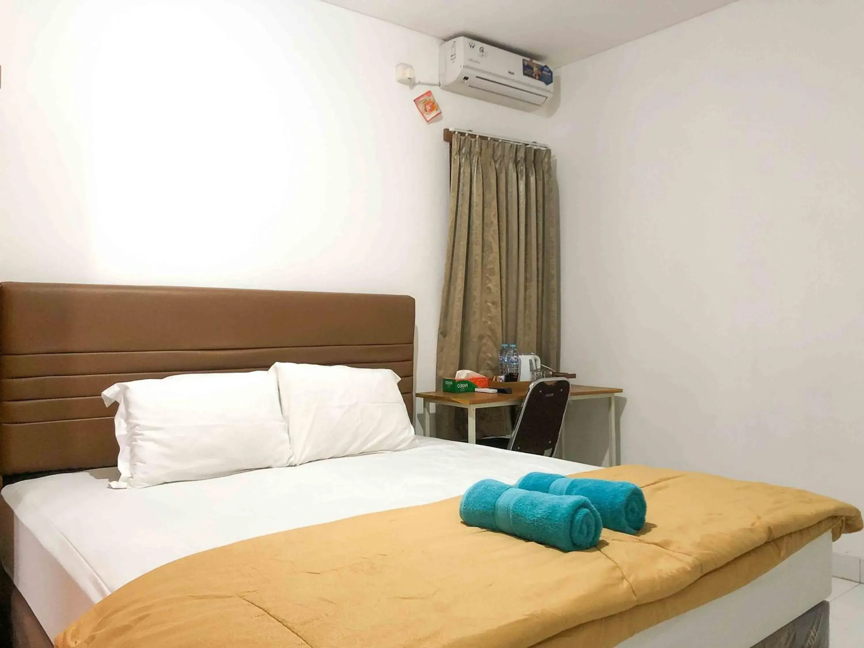 Bed in Sofia Residence Syariah Mitra RedDoorz Bed in Sofia Residence Syariah Mitra RedDoorz