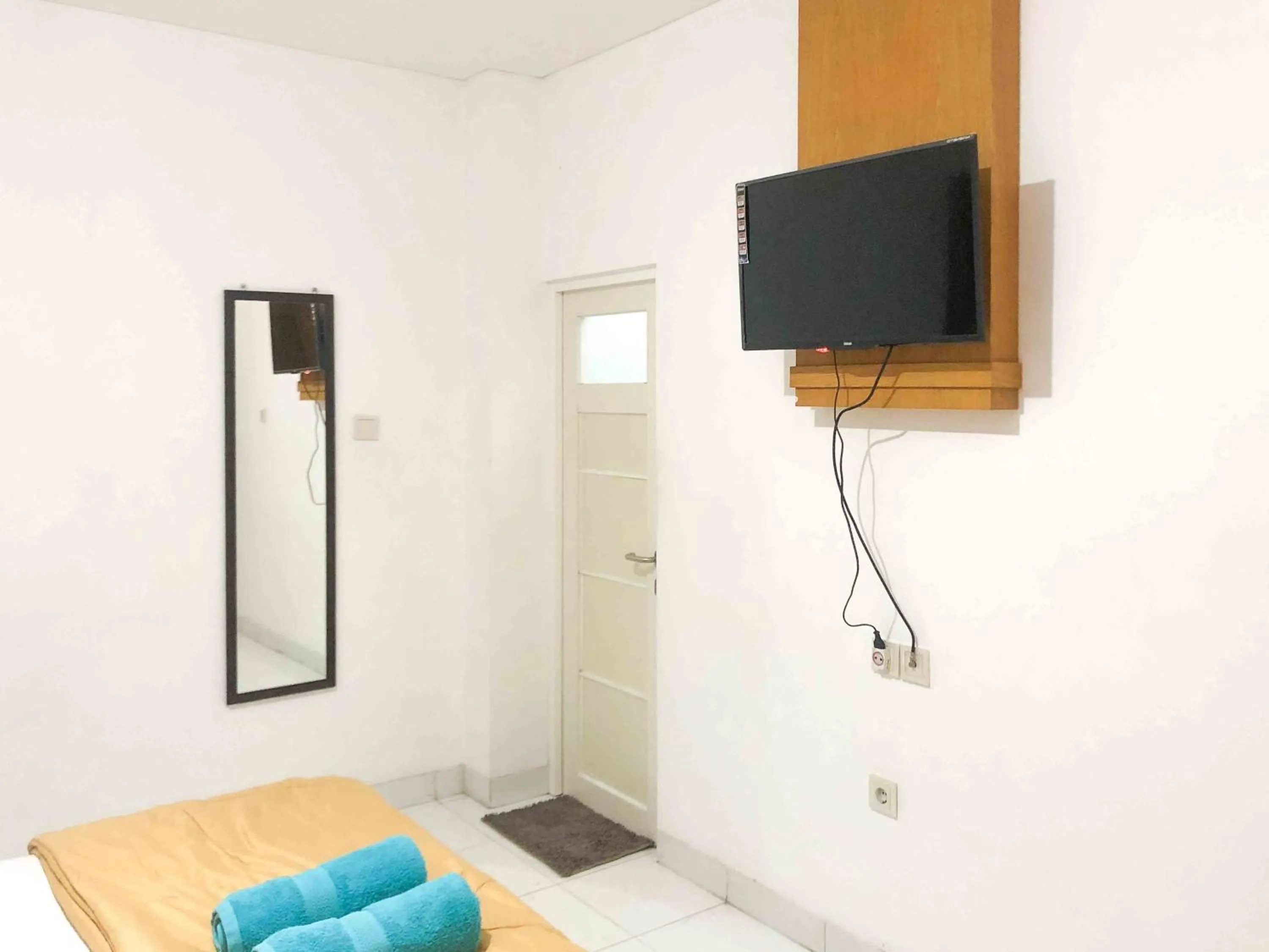 Bed in Sofia Residence Syariah Mitra RedDoorz