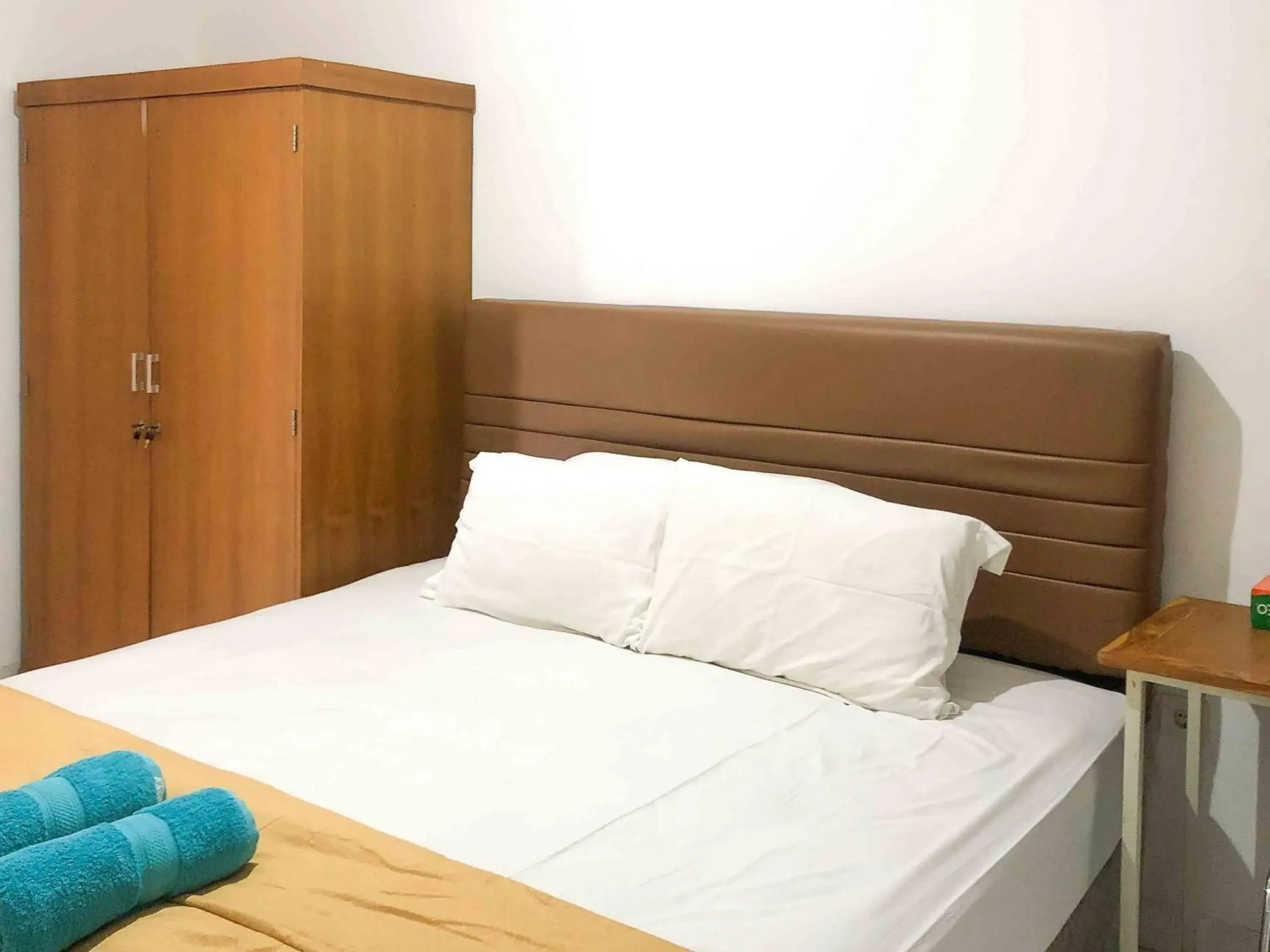 Bed in Sofia Residence Syariah Mitra RedDoorz Bed in Sofia Residence Syariah Mitra RedDoorz