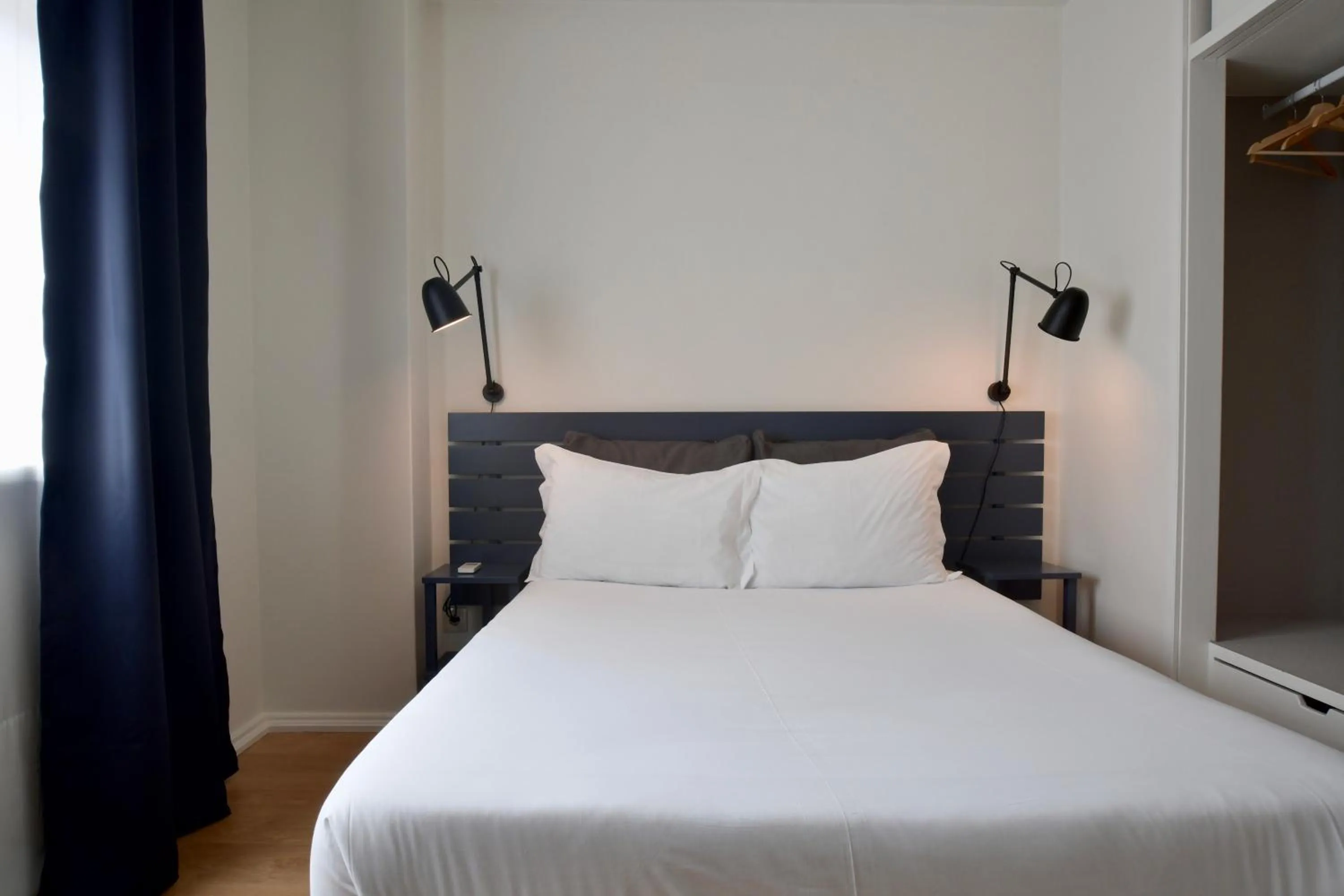 Bedroom, Bed in Spot Apartments