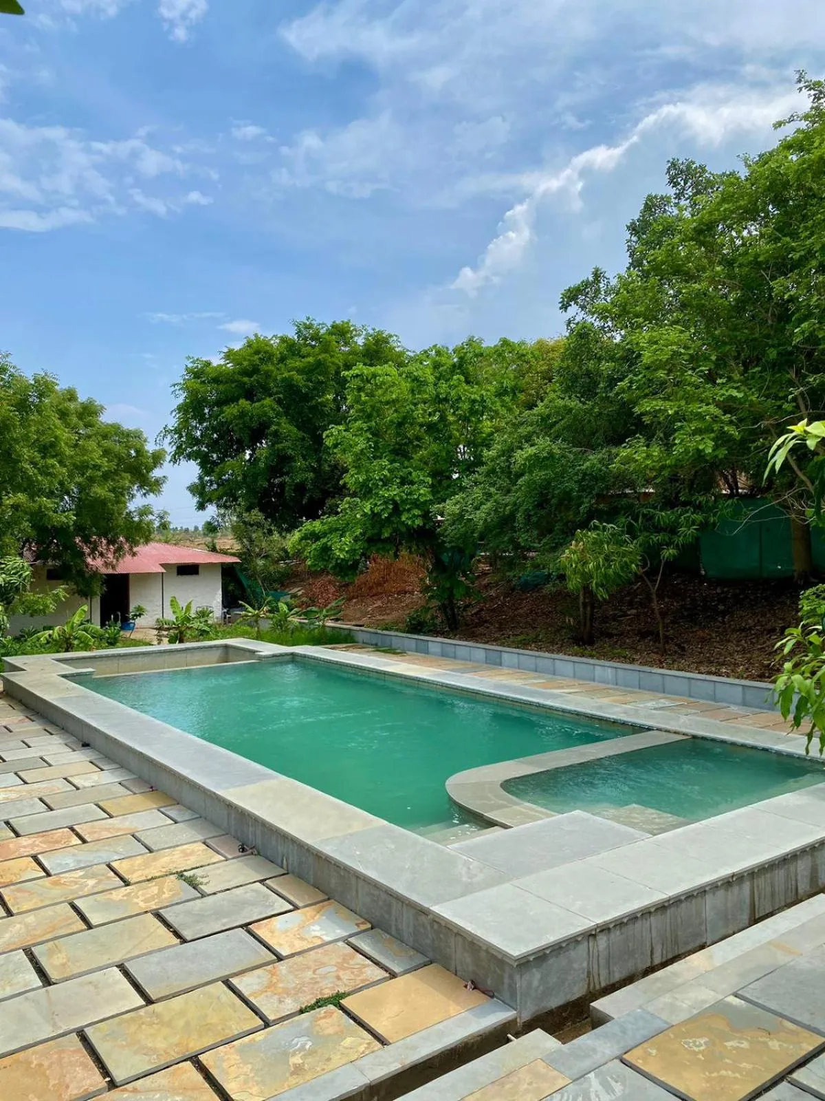 Swimming pool in Pangarh Lake Retreat