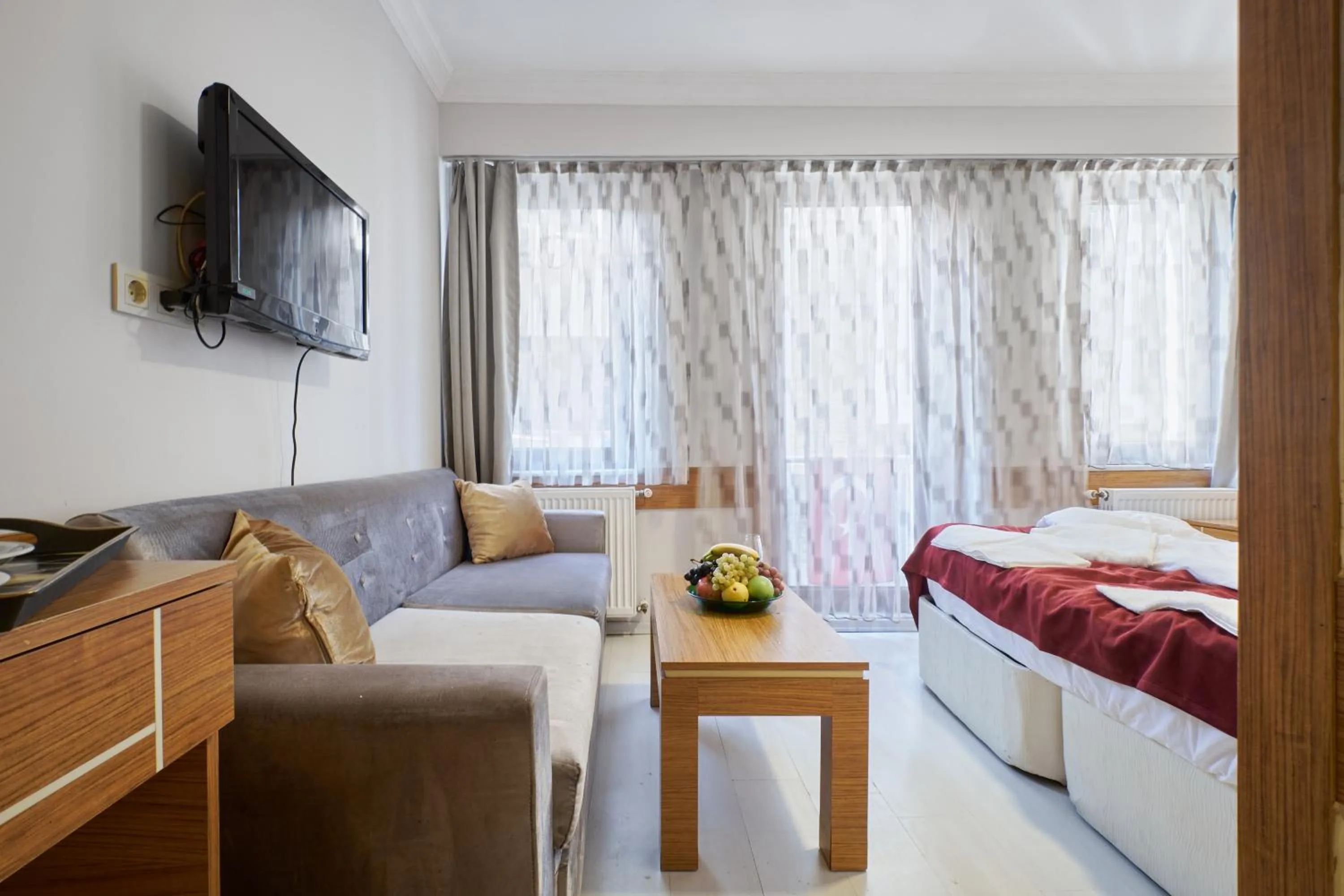 TV and multimedia, Bed in Central Suites Taksim