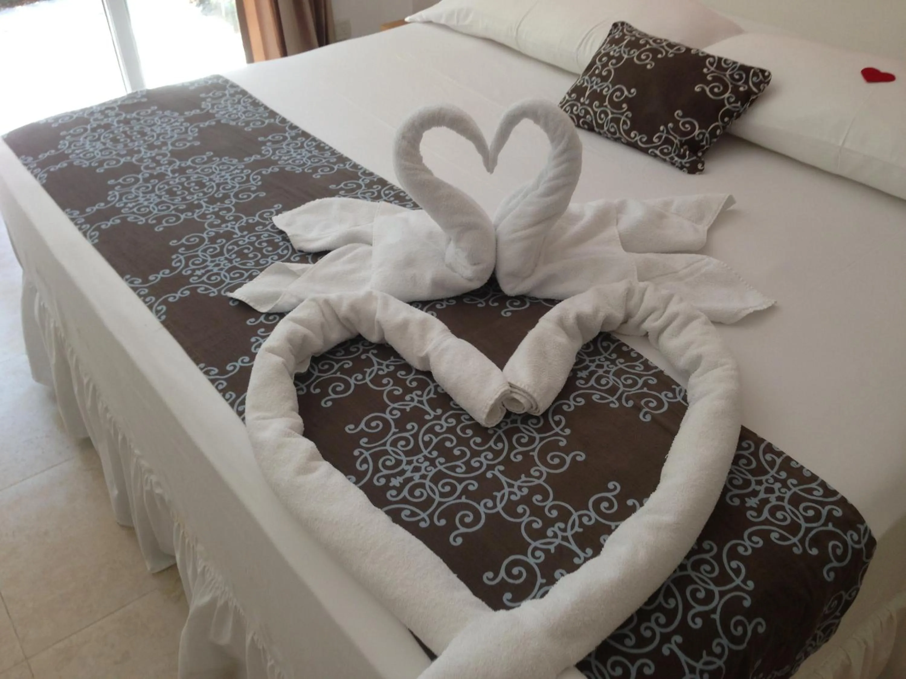 Bed in Montelaguna Boutique Hotel