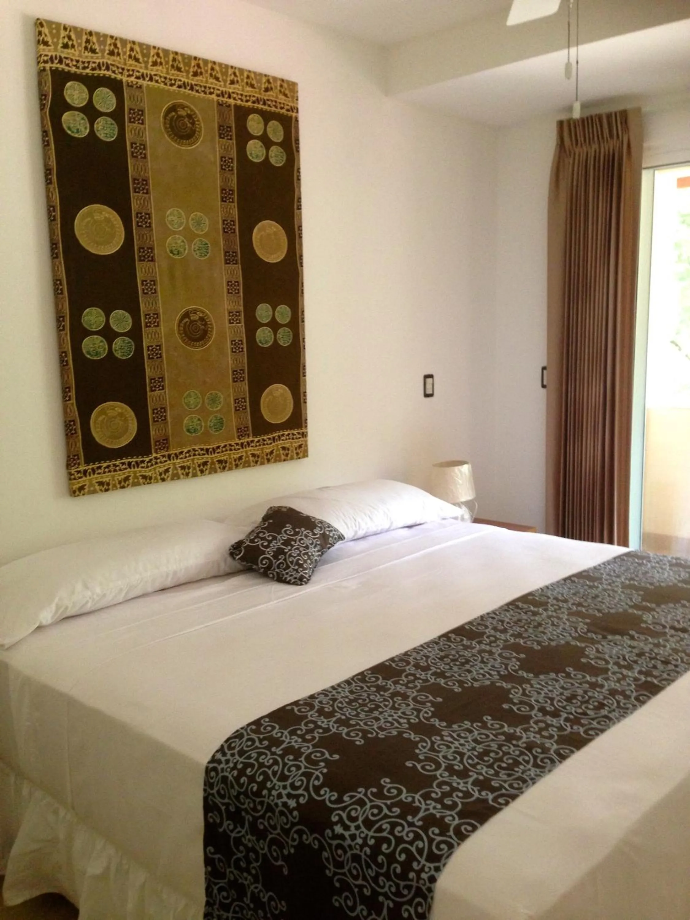 Bed in Montelaguna Boutique Hotel