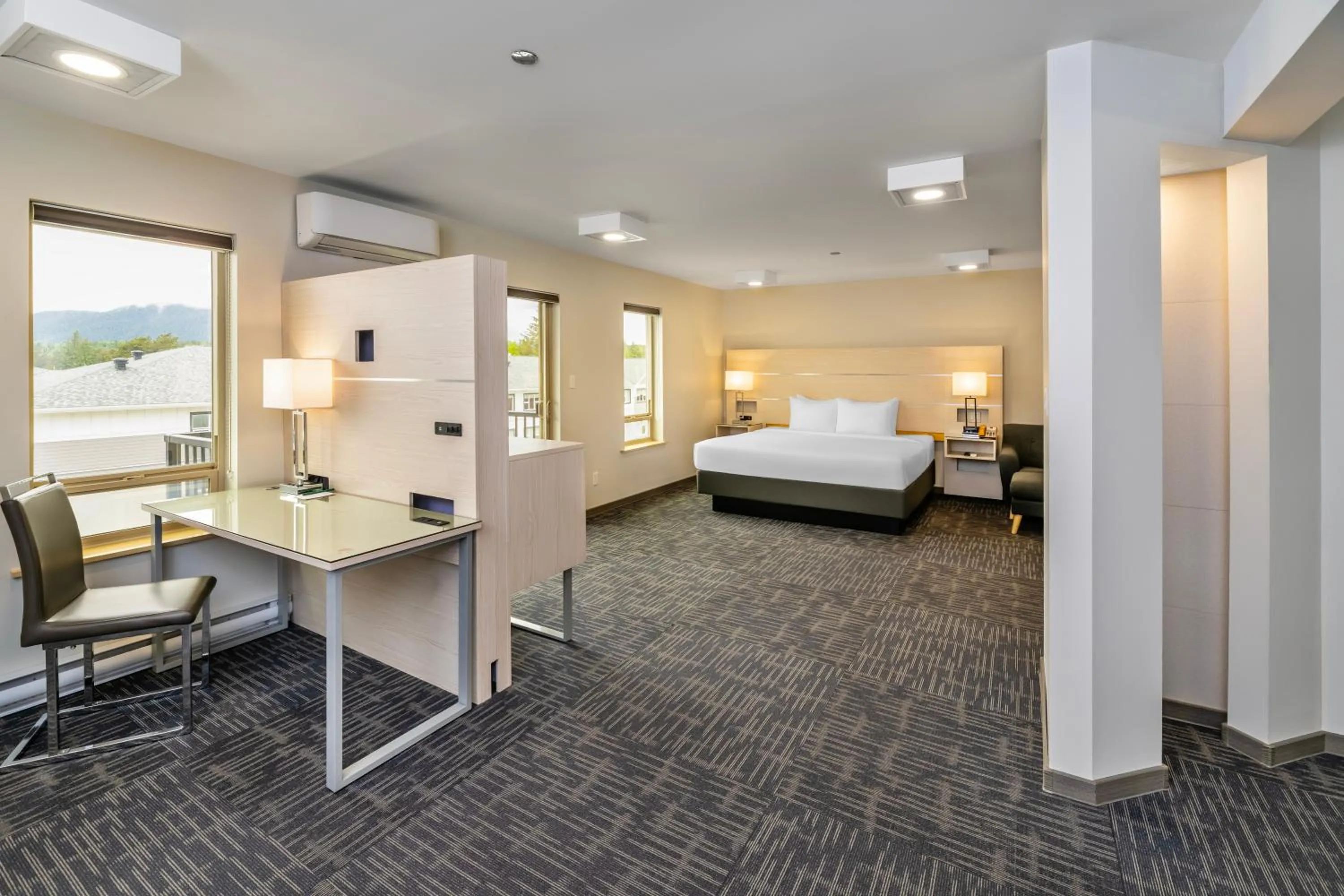 Bed in Quality Inn Sunshine Suites