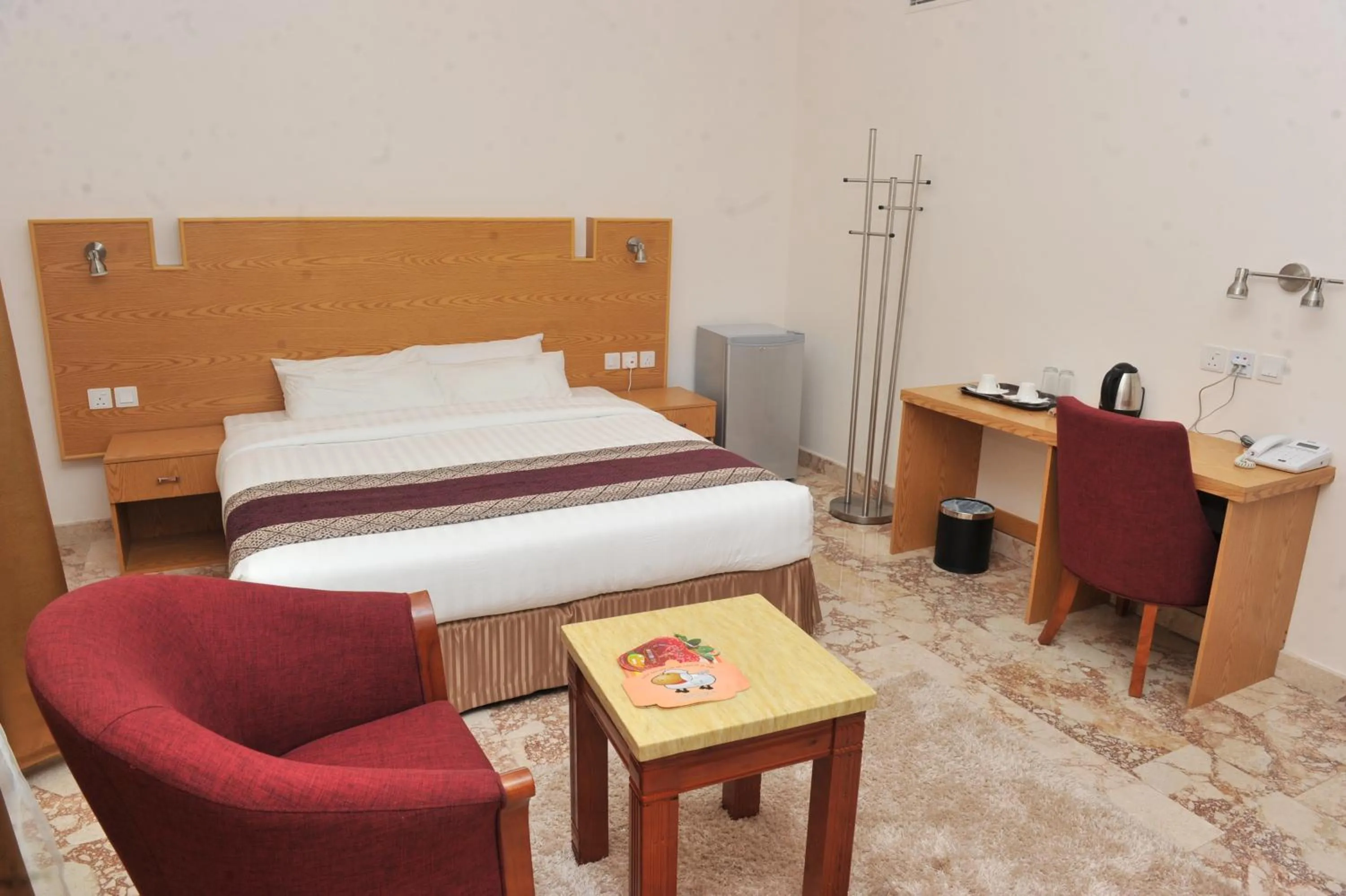 Bed in Al Reef Hotel