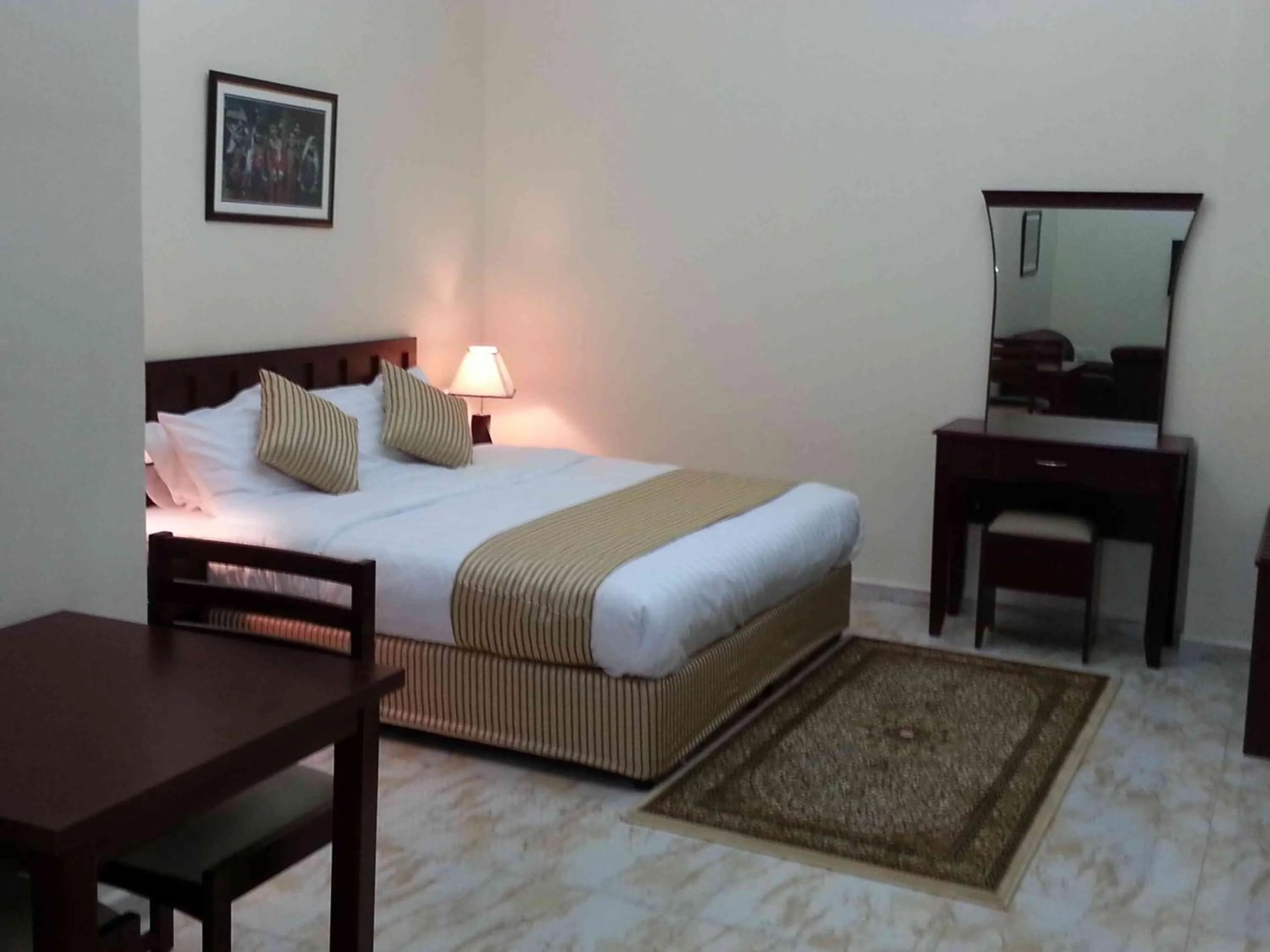 Bed in Al Ferdous Hotel Apartments