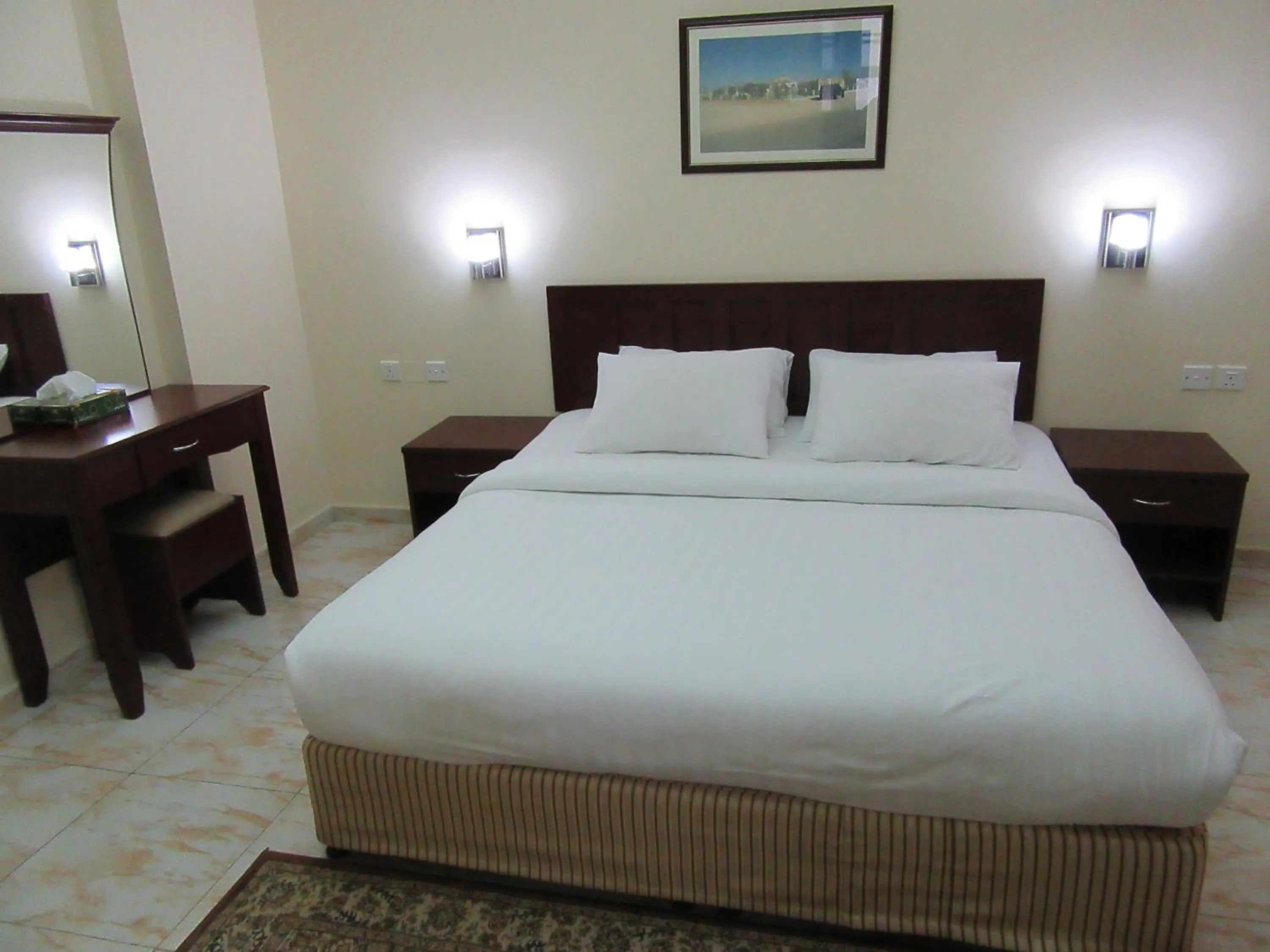 Bed in Al Ferdous Hotel Apartments