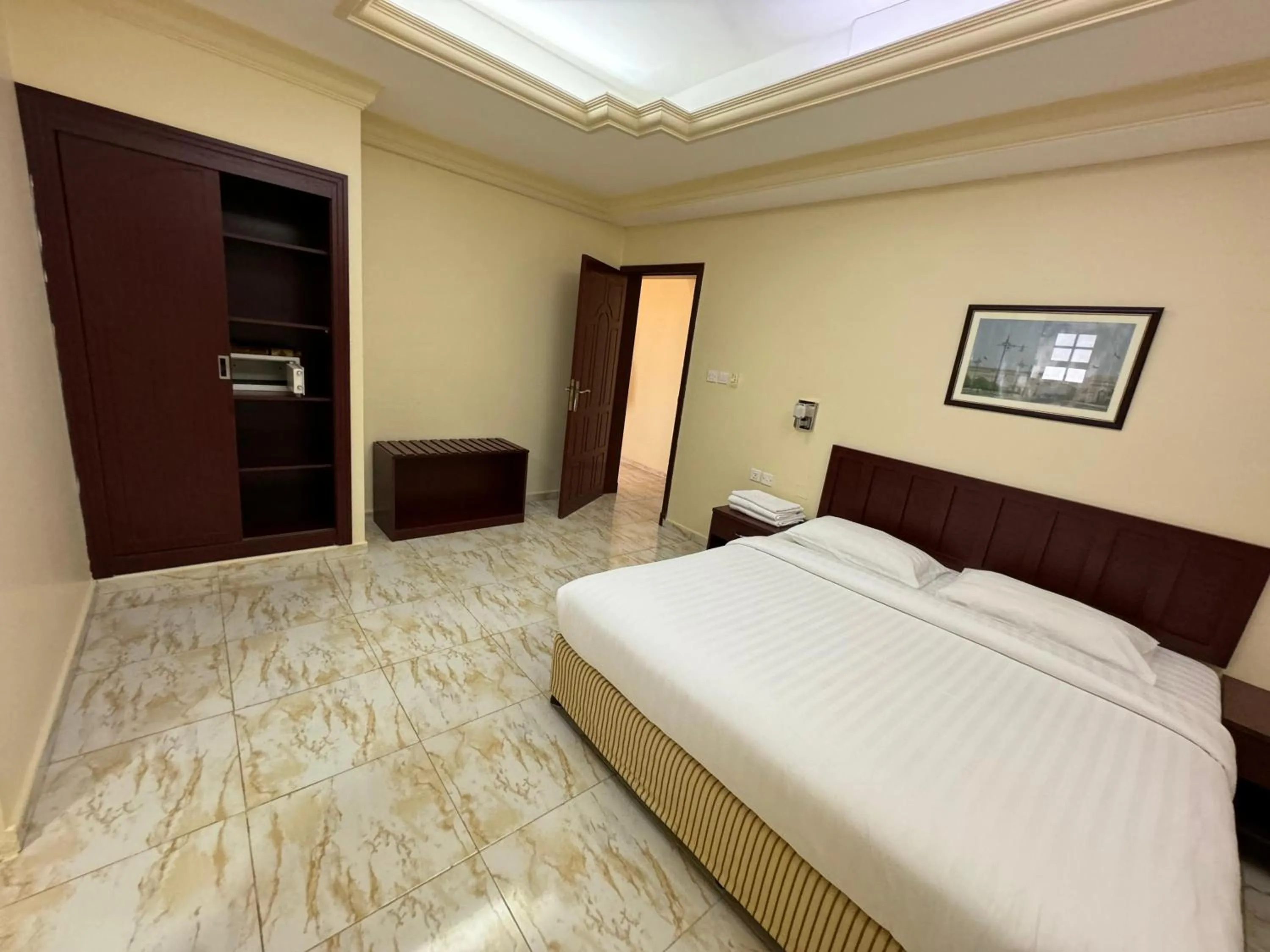 Bed in Al Ferdous Hotel Apartments