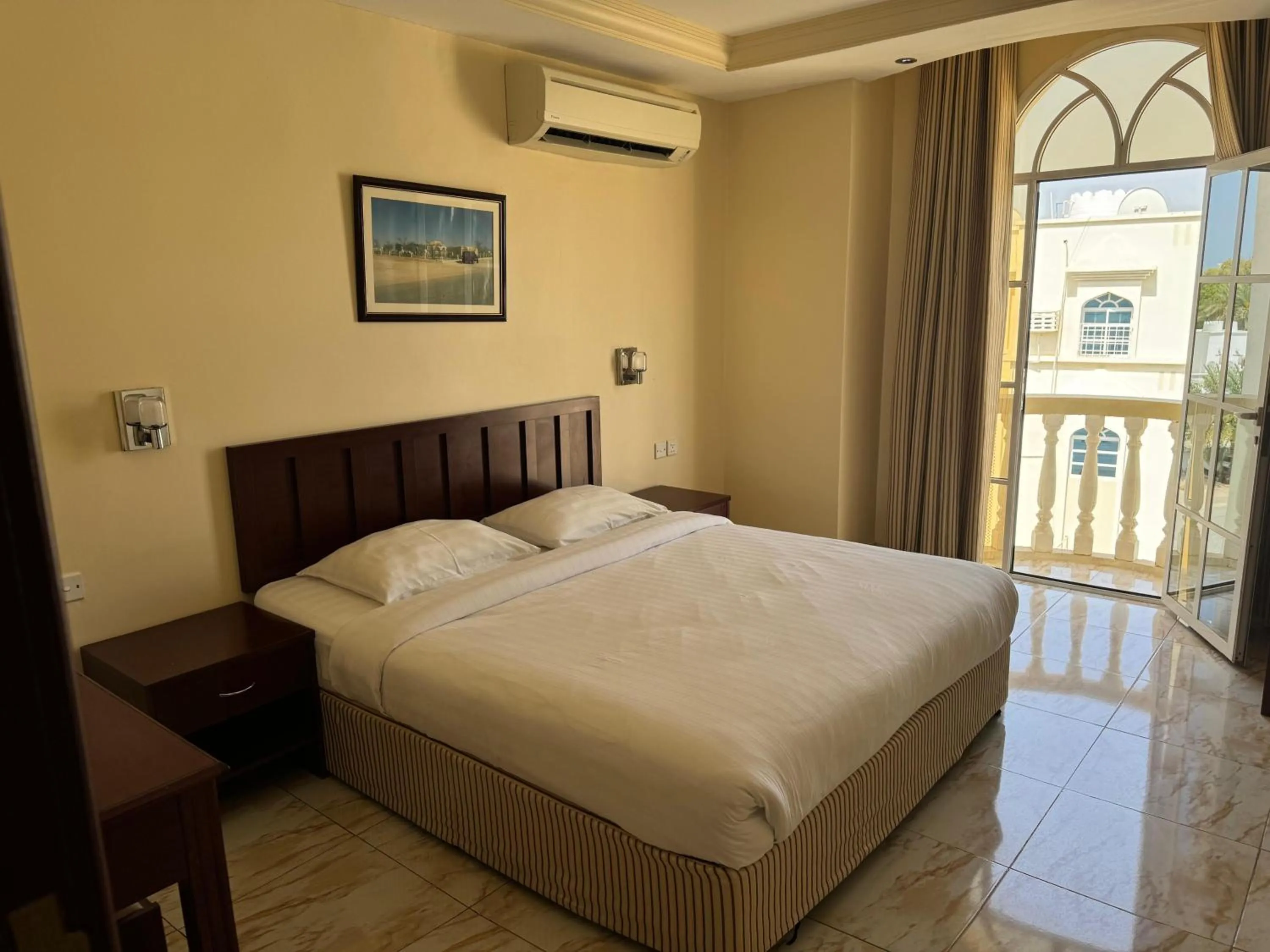 Bed in Al Ferdous Hotel Apartments