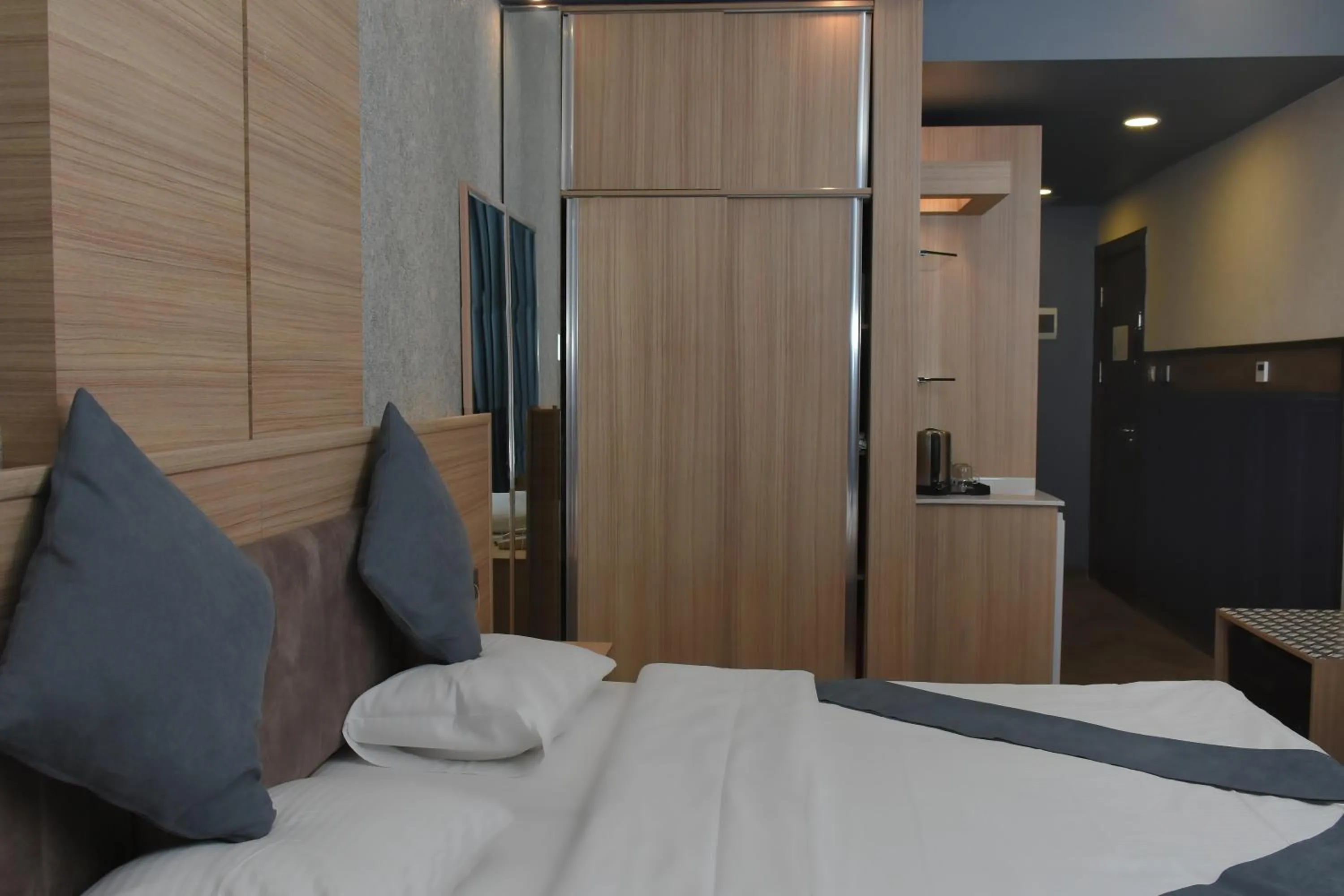 Bed in Asenappar Hotel