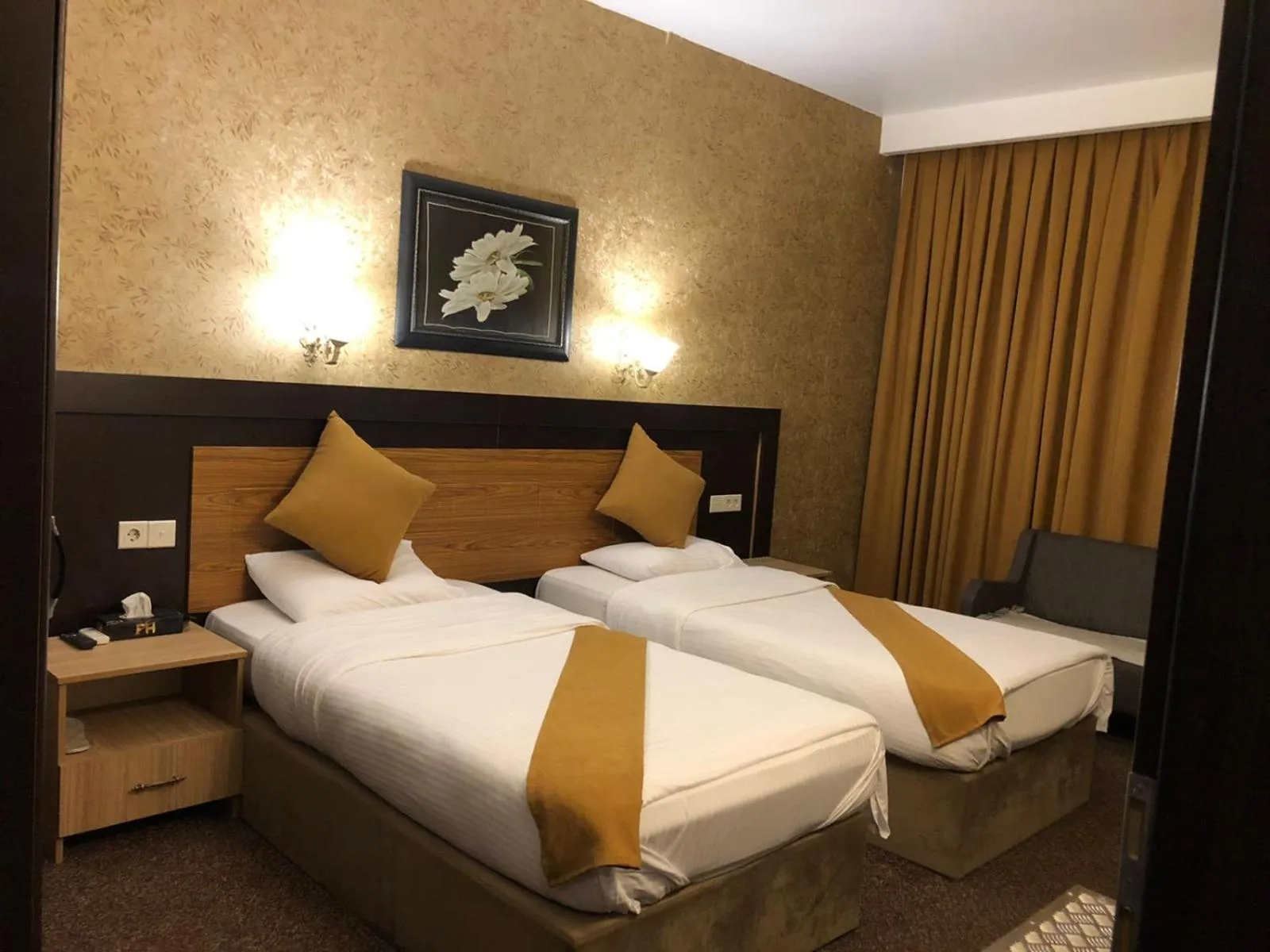 Bed in Asenappar Hotel