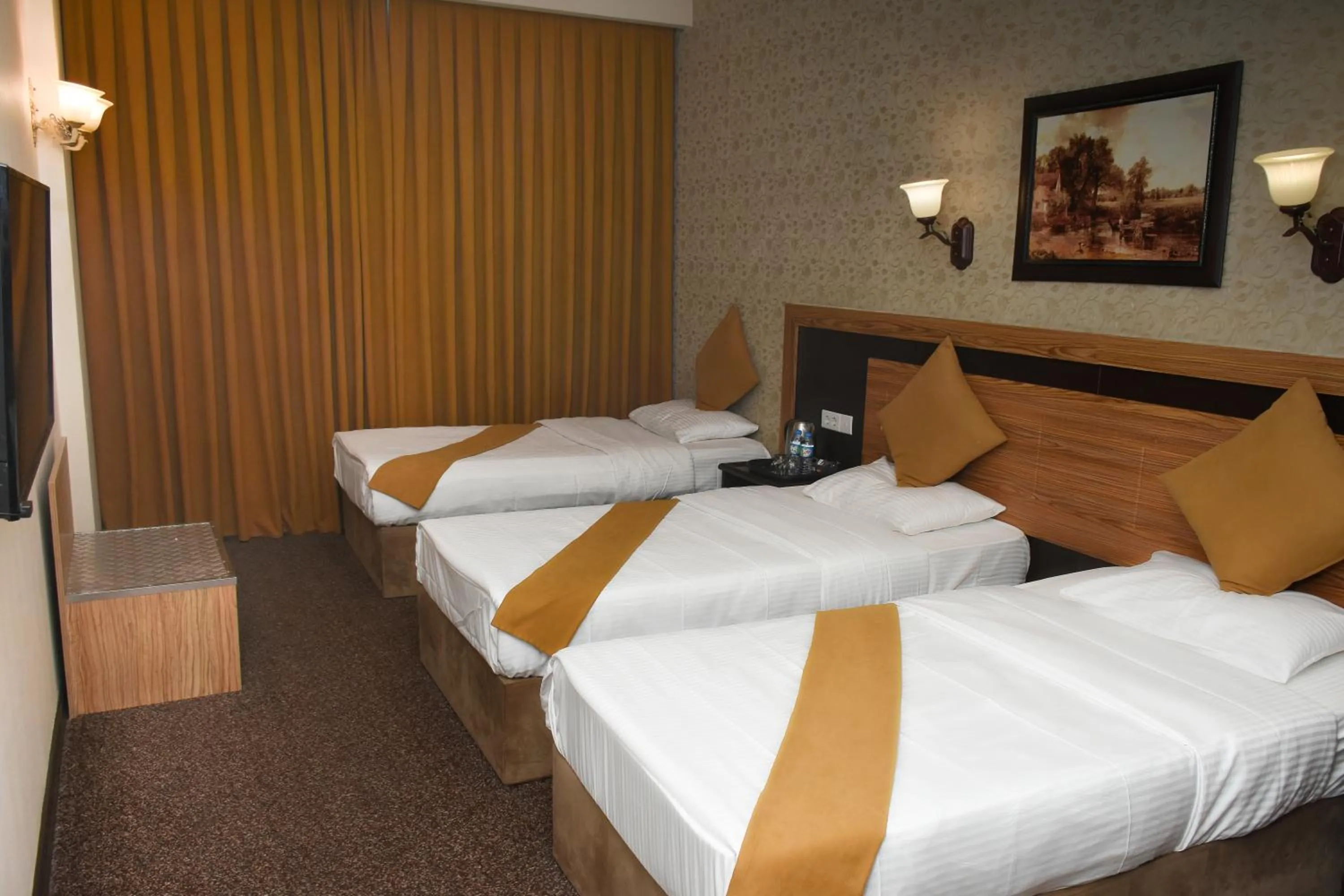 Bed in Asenappar Hotel